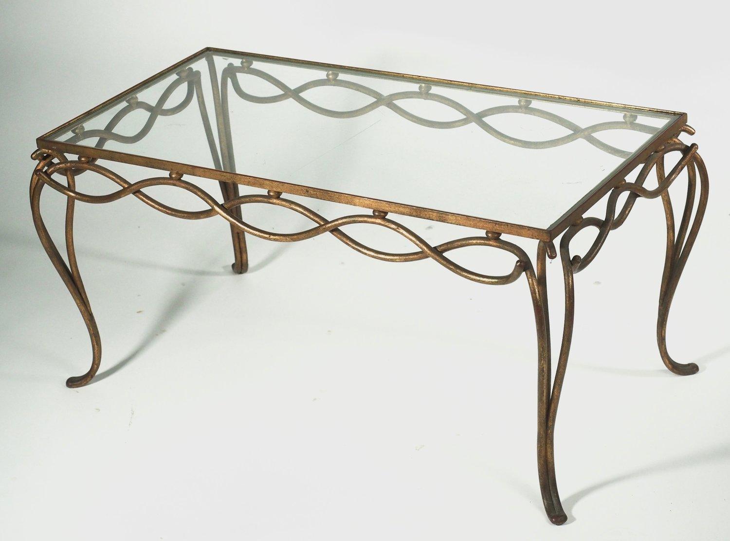 French 1940s Art Deco coffee table in gilt forged iron by Rene Drouet. Takes glass inset top.

 