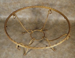 Grande table basse ronde en fer doré Rene Drouet