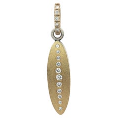 Rene Escobar Silver 
18k Yellow Gold 0.25ctw Diamond Navette Long Oval Pendant