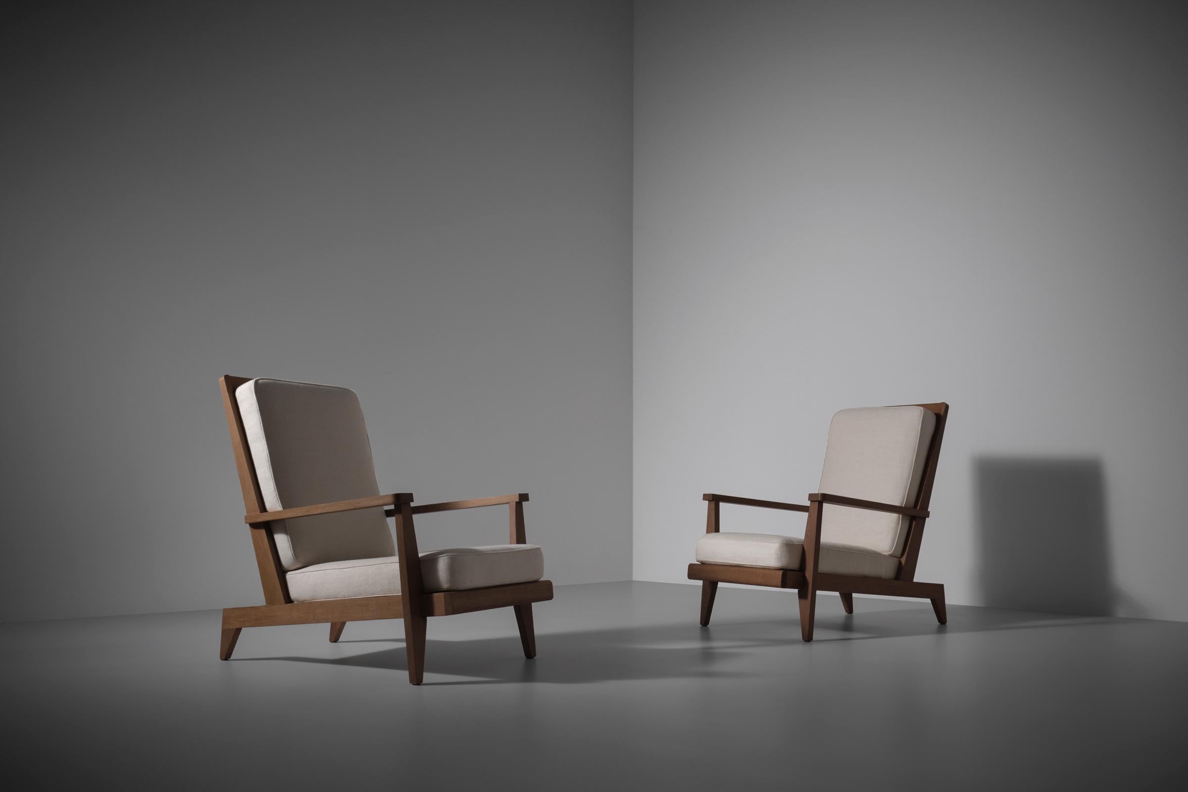 Rare pair of lounge chairs by René Gabriel (1890 - 1950). This model was designed in 1946 and was presented at the the ’Salon des artistes décorateurs' in 1953. Literature: René Gabriel by Pierre Gencey page 286.
Gabriel was president of the Société