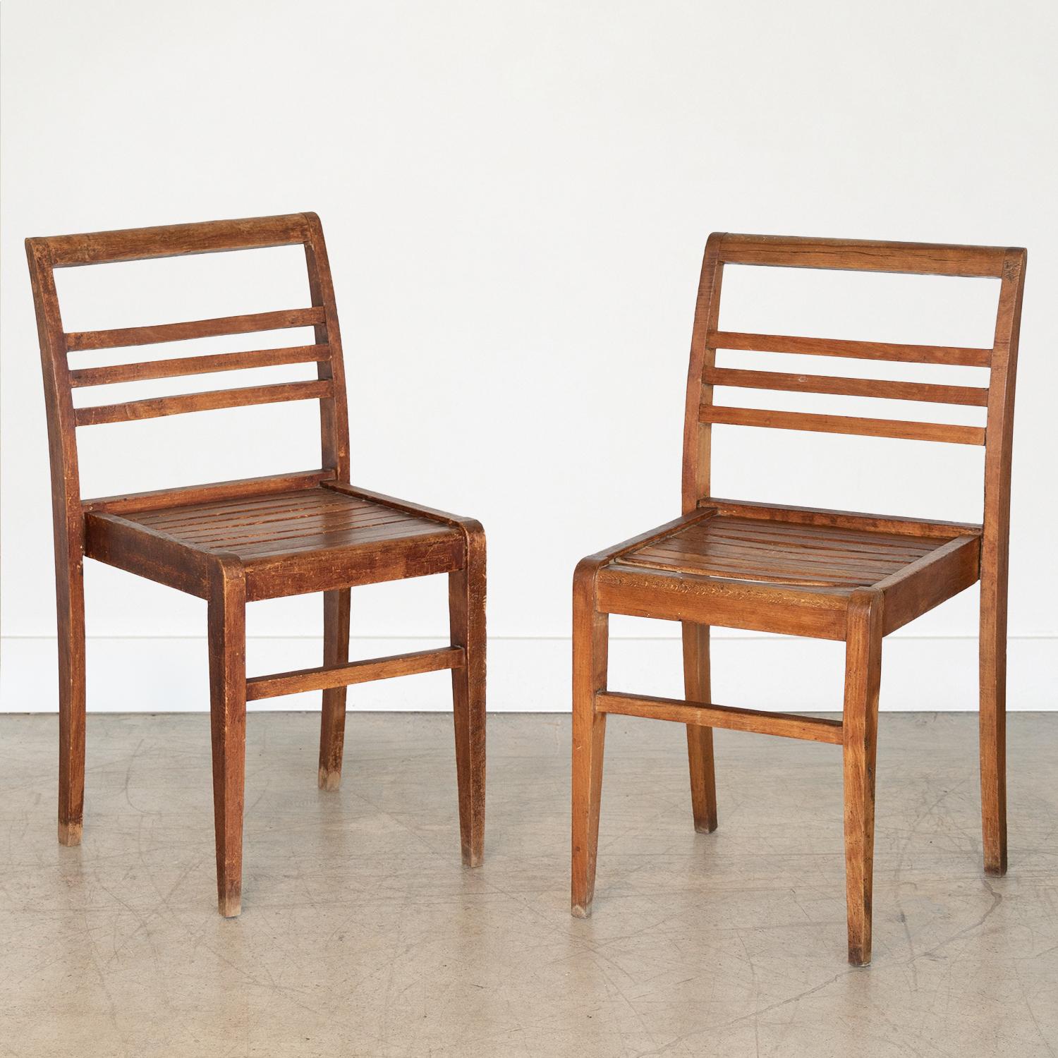 French oak chair designed by René Gabriel in the late 1940's. Two still available, sold and priced individually.