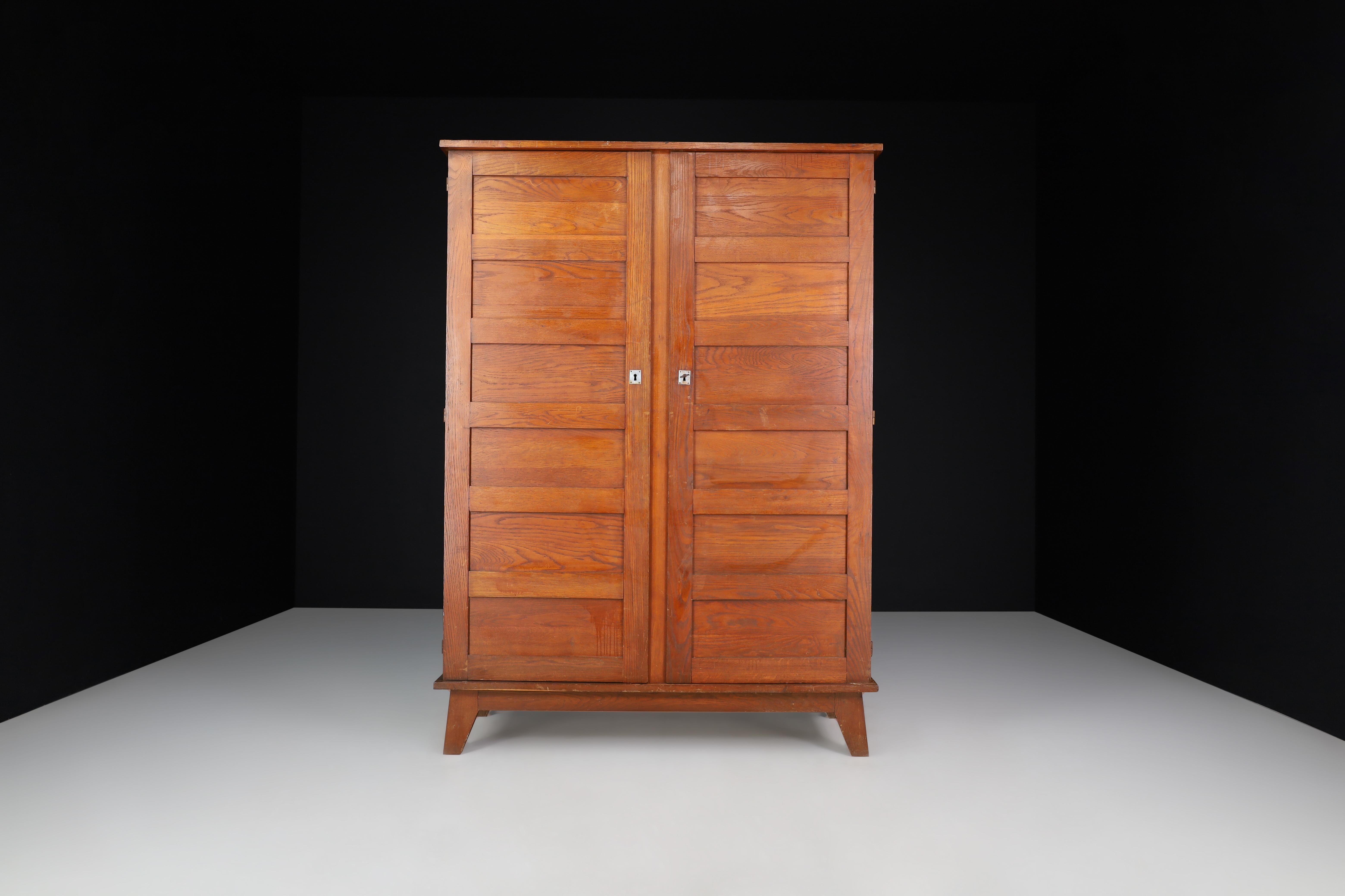 Mid-Century Modern René Gabriel Patinated Oak Armoire France, 1940 For Sale