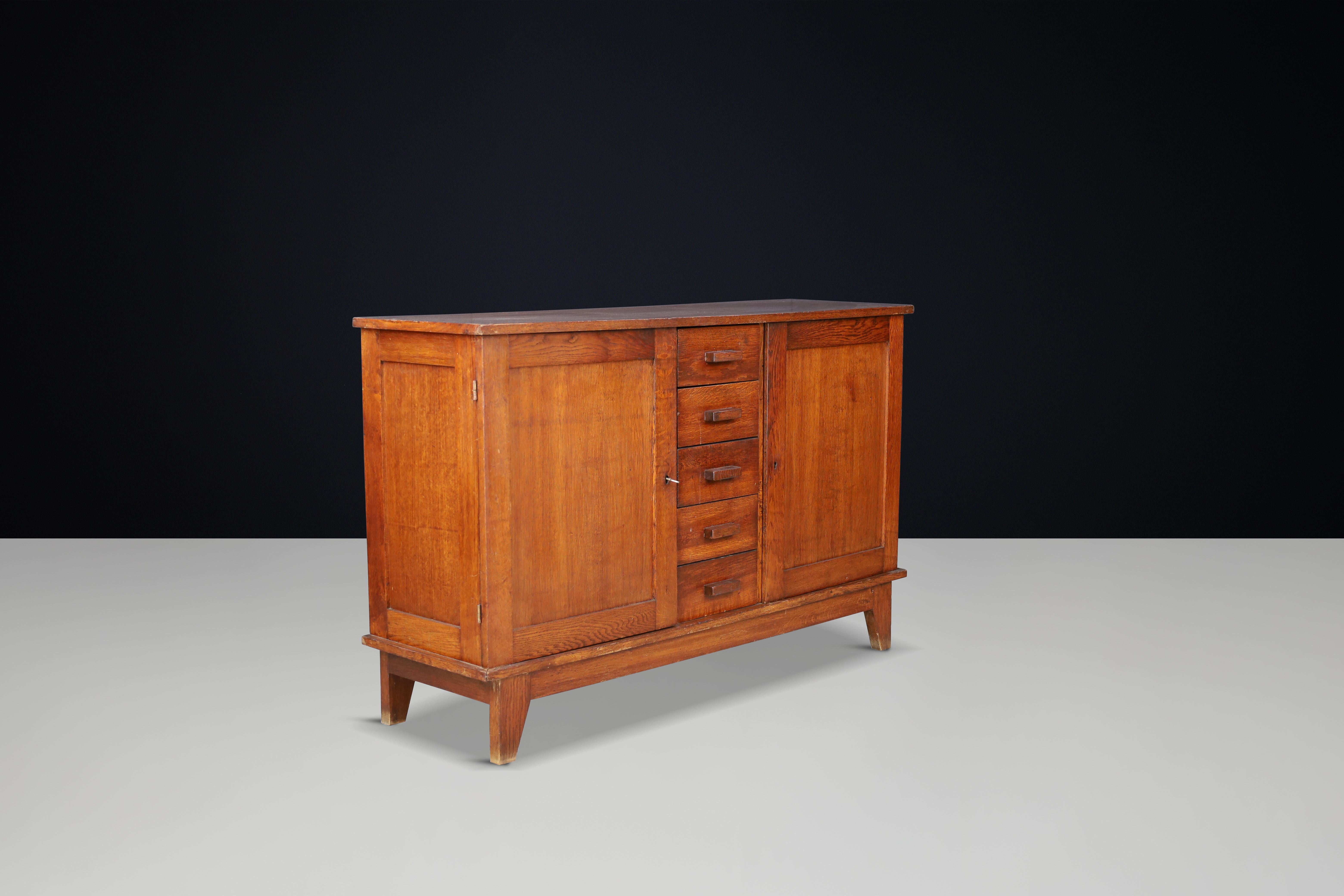 Mid-Century Modern René Gabriel Patinated Oak Sideboard, France, 1940s For Sale