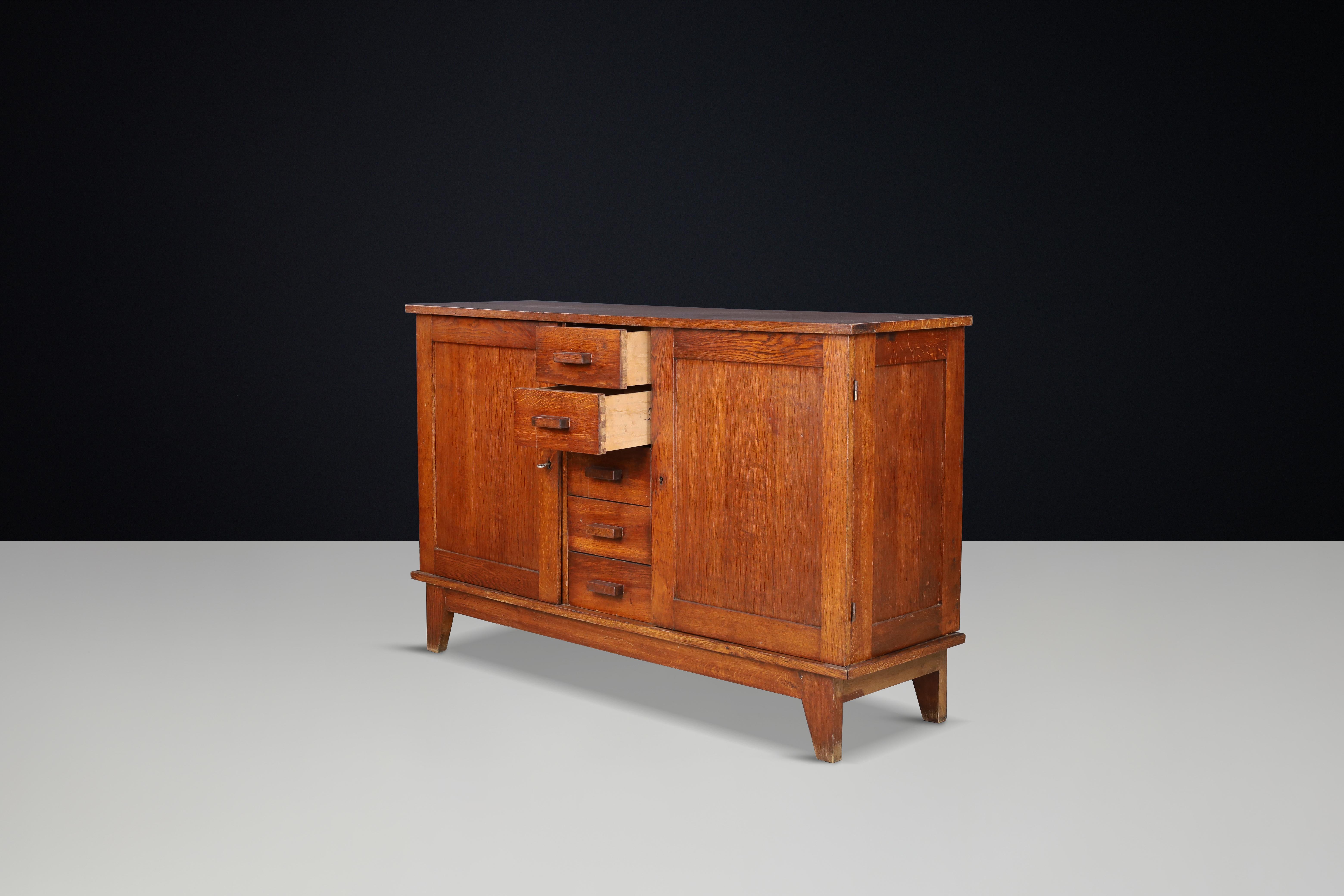 French René Gabriel Patinated Oak Sideboard, France, 1940s For Sale