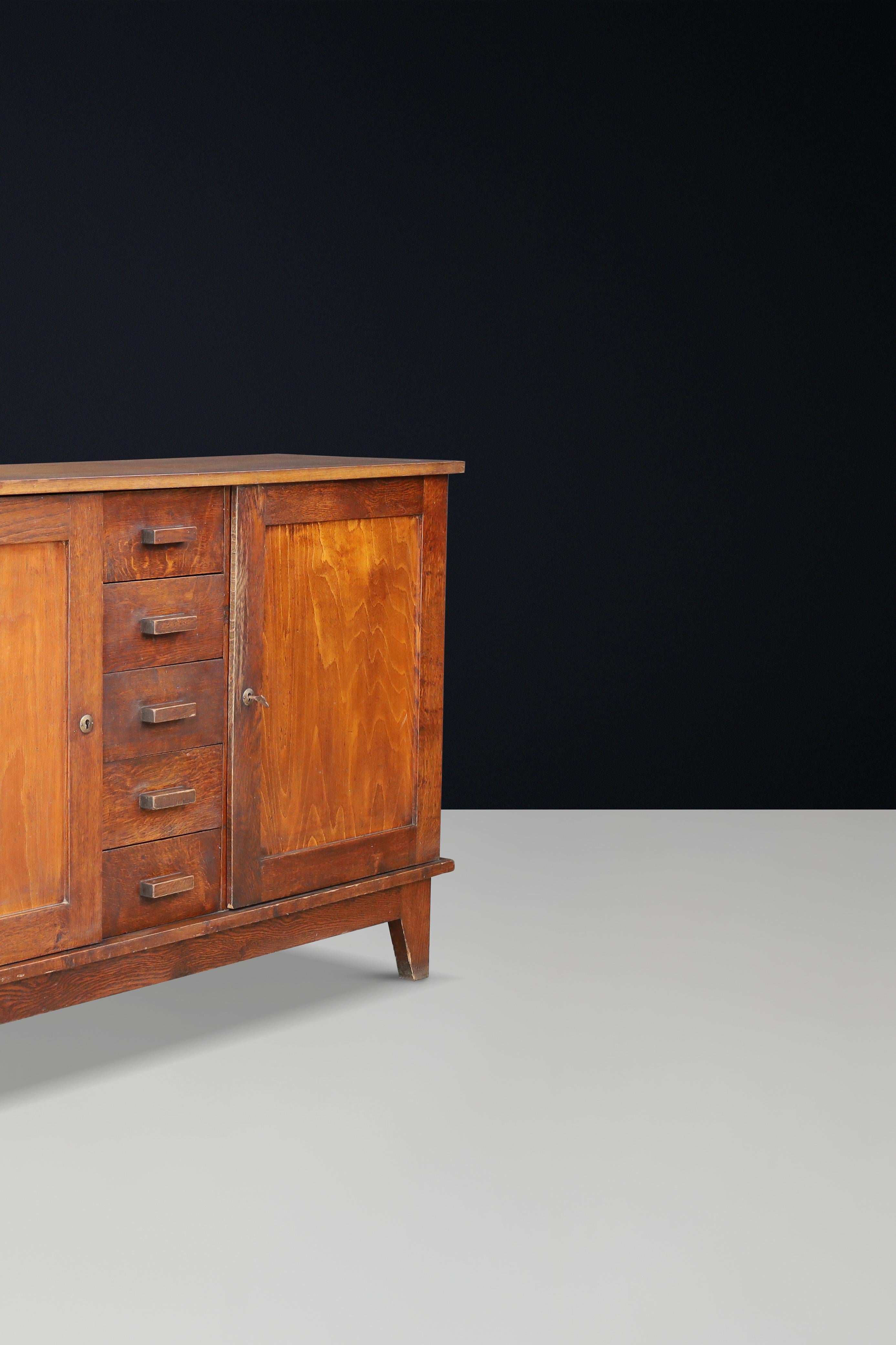 20th Century René Gabriel Patinated Oak Sideboard, France, 1940s For Sale