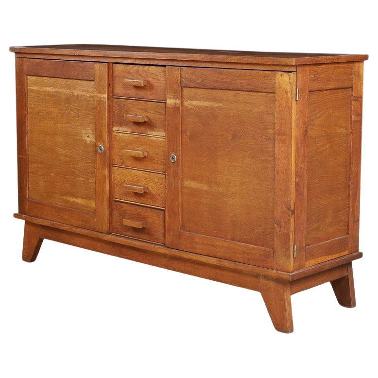Buffet en chêne patiné René Gabriel, France, années 1940 en vente