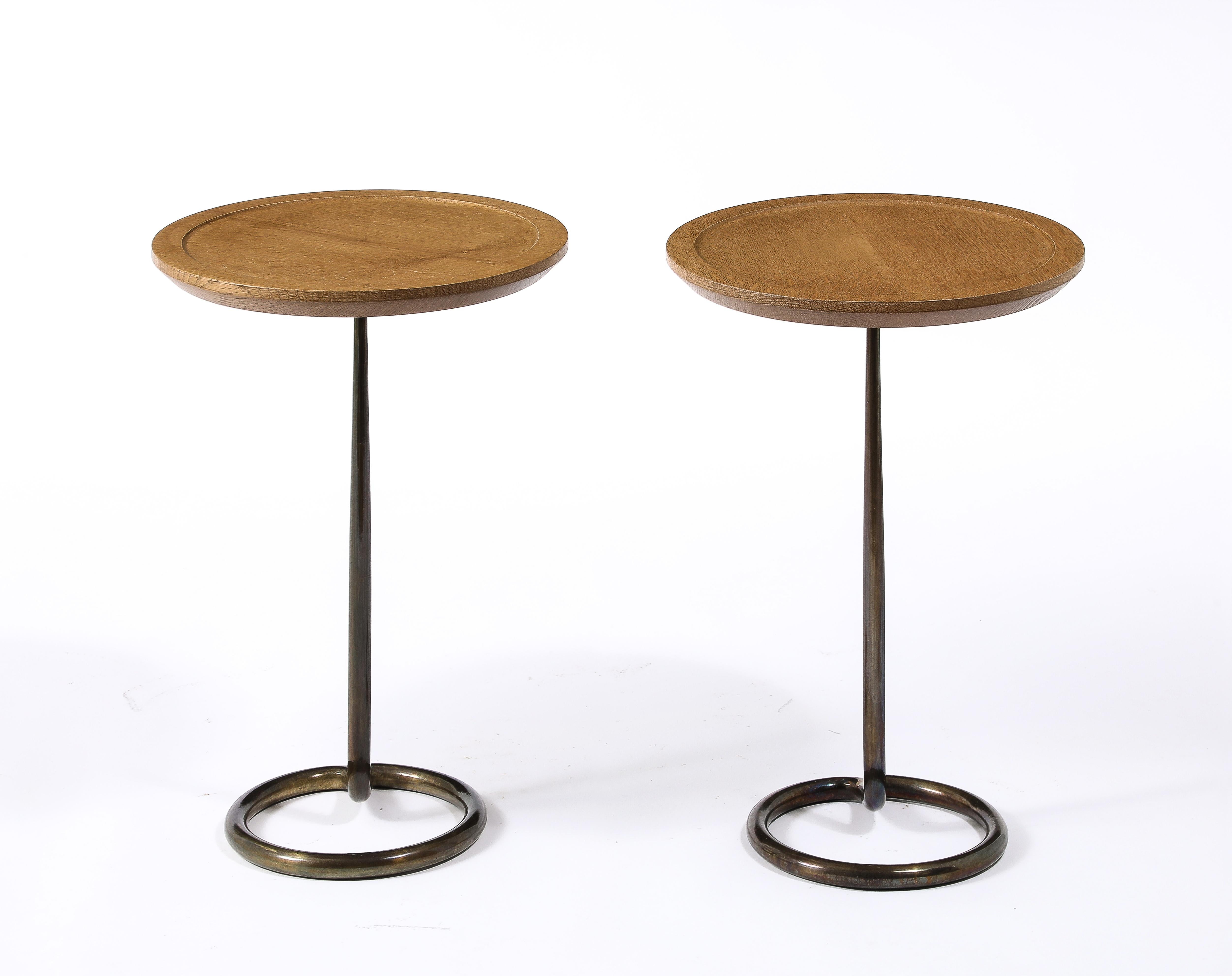 Elegant drink tables or side tables by René Herbst for Stablet, Brass stem with a carved oak top.