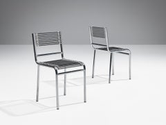 René Herbst - Paire de chaises de salle à manger "Sandows" en acier et cordon