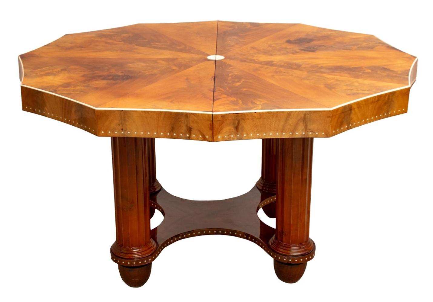 Rene Joubert and Philippe-Etienne Petit for Decoration Interieure Moderne (D.I.M.) Mahogany Table, circa 1928.
A stunning example of Art Deco design, this mahogany center table by renowned designers Rene Joubert and Philippe-Etienne Petit for