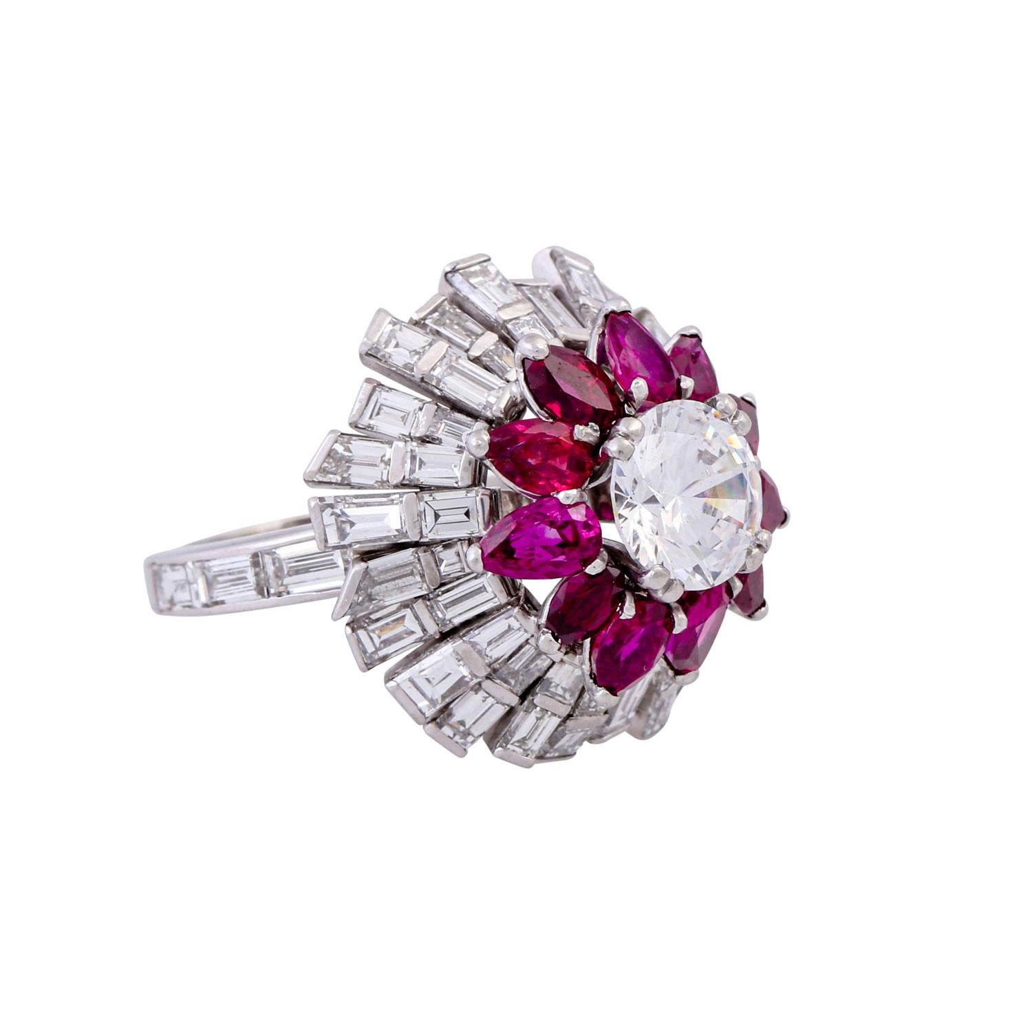 good color and clarity, baguette and trapezoid cut, a diamond imitation in the middle, rubies of good quality, total approx. 2.2 ct pear and navette cut, partly with notches, rubbed, platinum, 14.7 g, RW: 57, 2nd half of the 20th century, signs of
