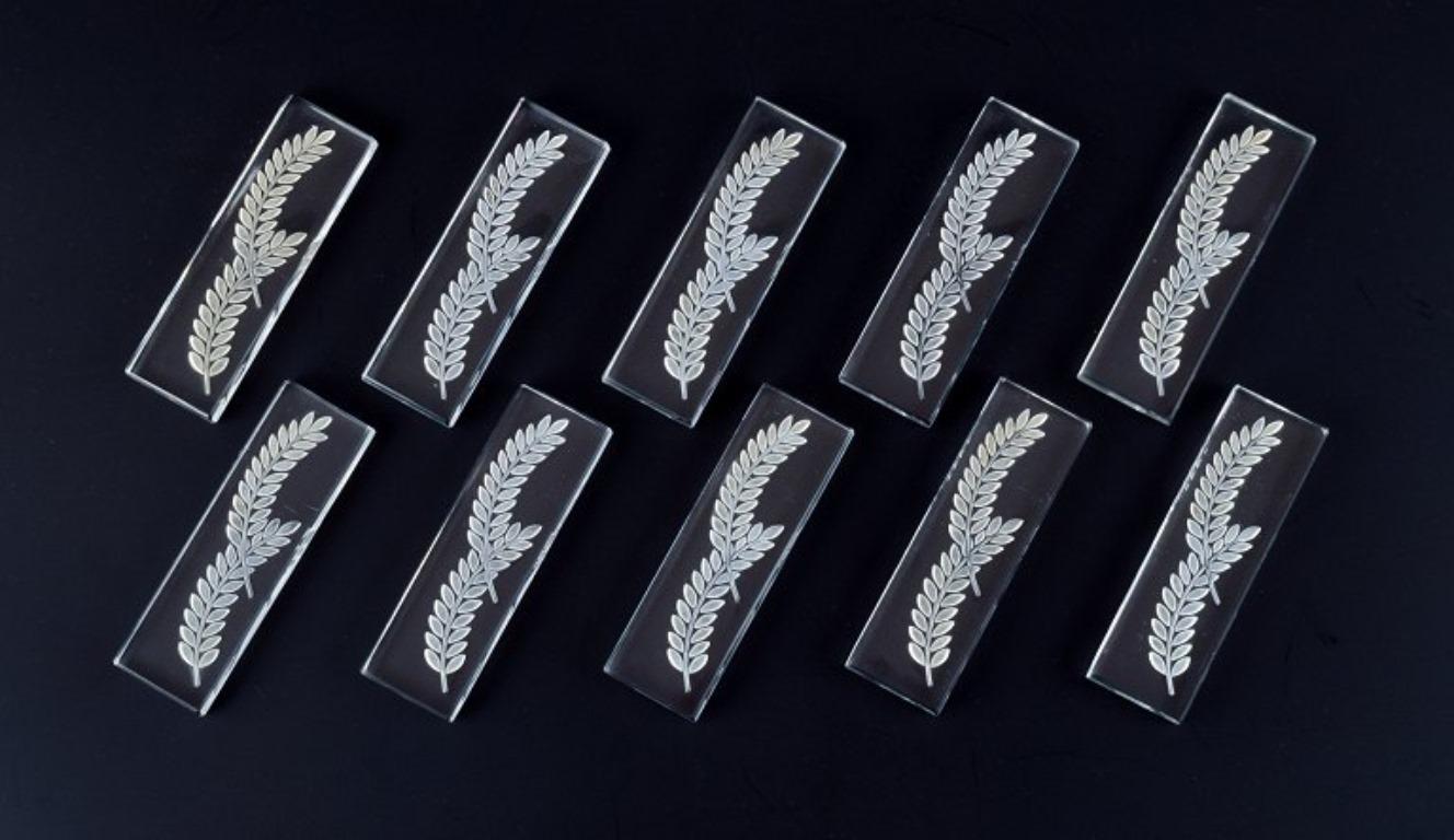 René Lalique (1860-1945), a set of ten knife rests.
1942
Model 
