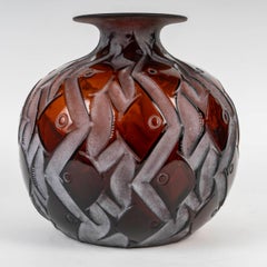 René Lalique, 1928 - “Penthièvre” Amber-Tinted Vase .