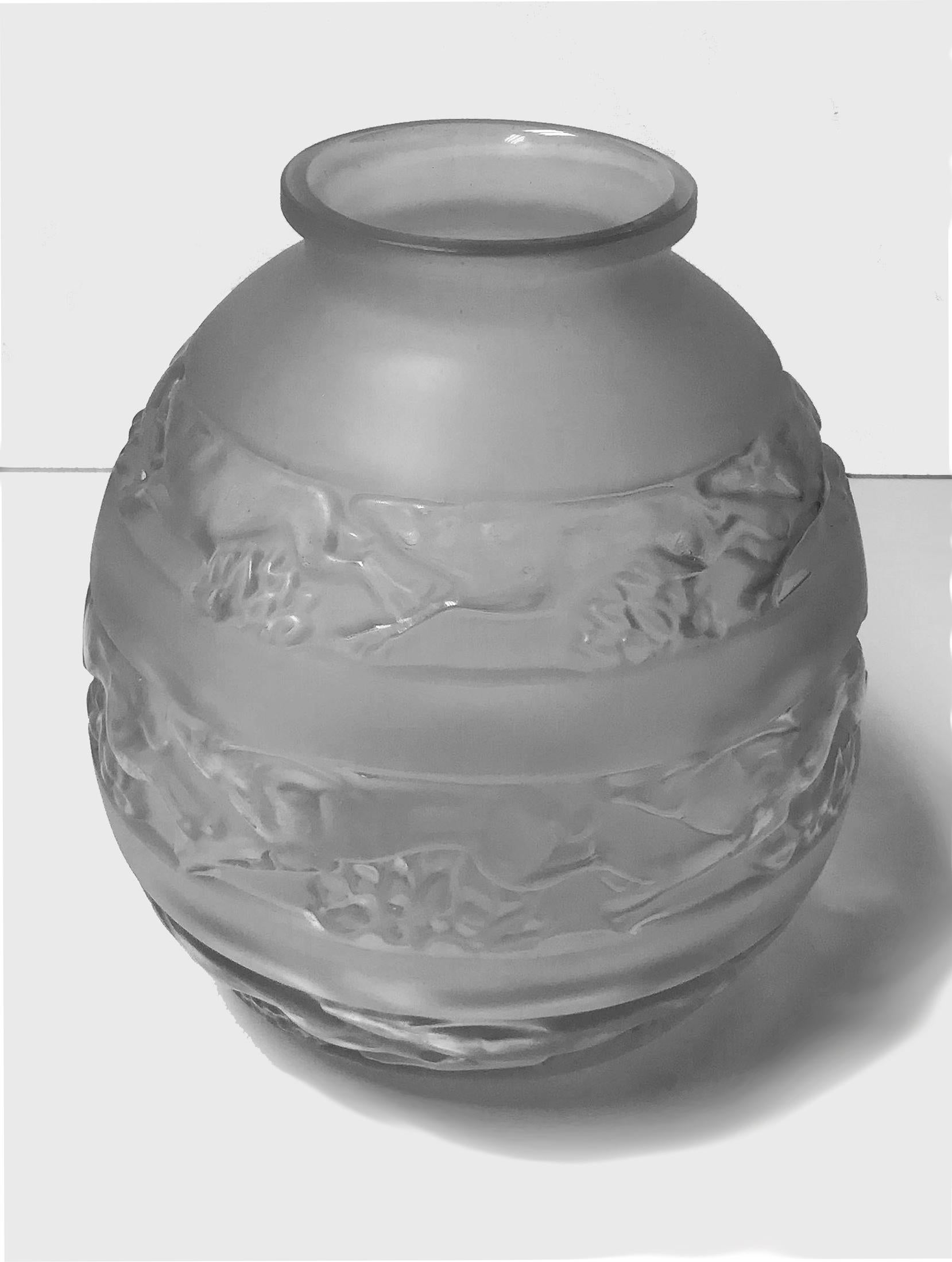 René Lalique (1860-1945) 1930s René Lalique signed vase. Pattern Soudan, three bands of gazelles mold blown clear frosted satin glass. Signed R. Lalique. Measures: Height 18.25cm. Condition: Good.