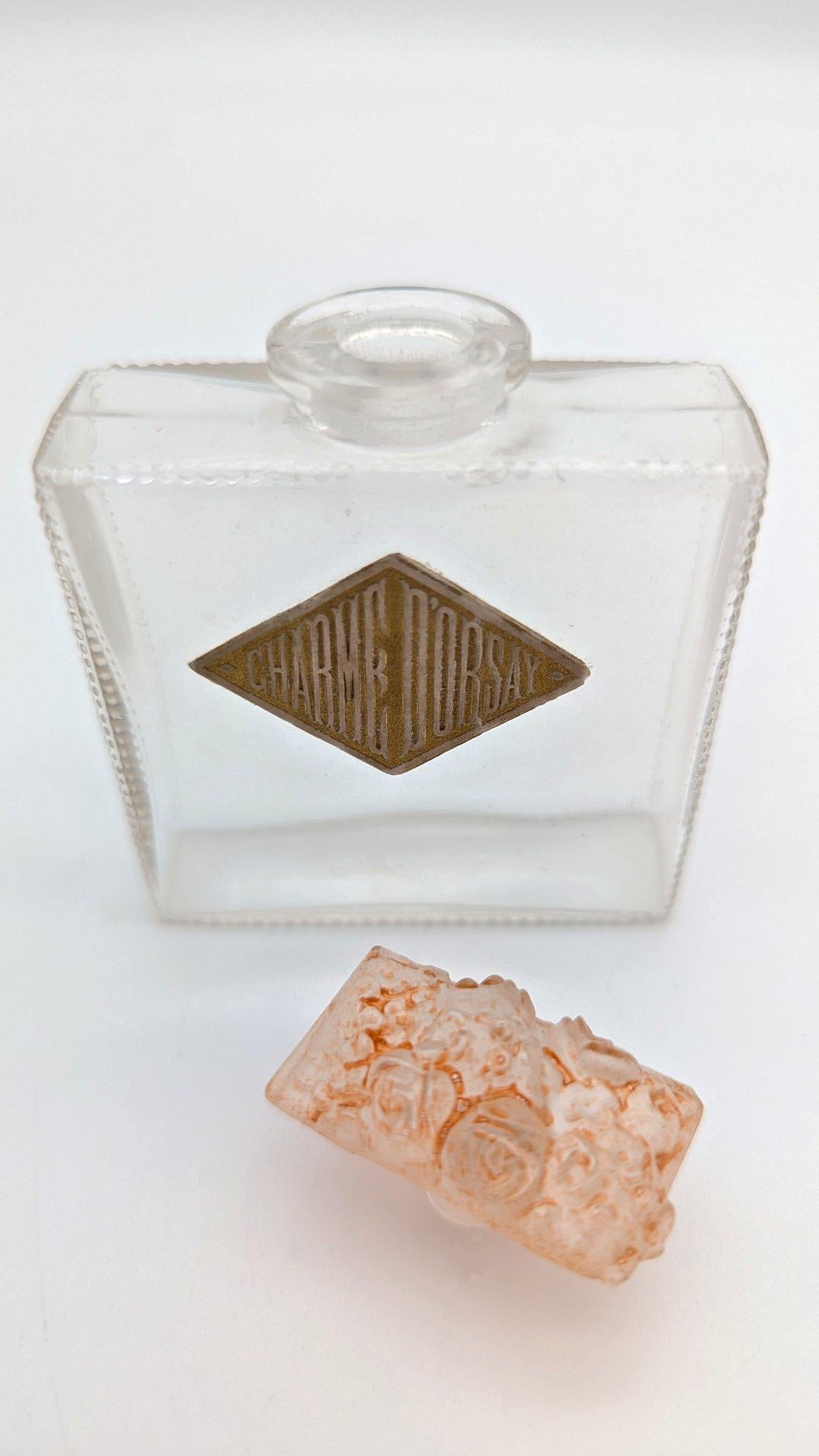 Pressed René Lalique a glass perfume bottle Fleurs de France for D’Orsay, ca. 1919 For Sale