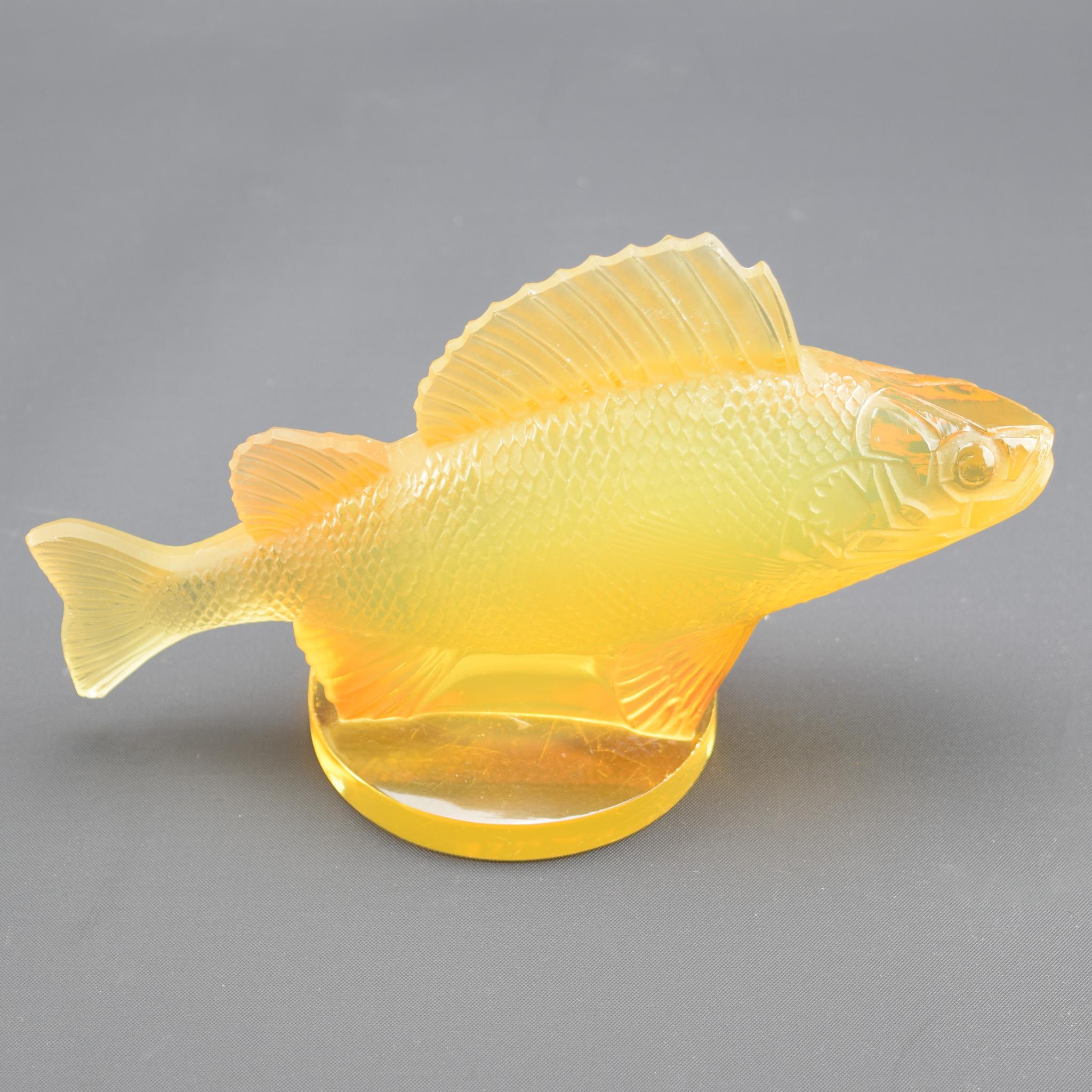 Rene Lalique amber opalescent  perche mascot.
Opalescent and clear version are the general examples found of this mascot, coloured glass example like this are rarely seen.

Wheel cut mark R Lalique France and moulded R Lalique
The condition is very