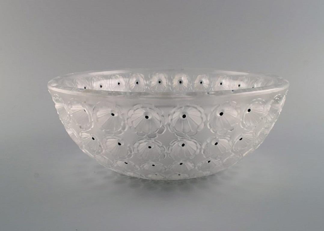 20th Century René Lalique Art Deco Nemours bowl in frosted art glass modelled with flowers.