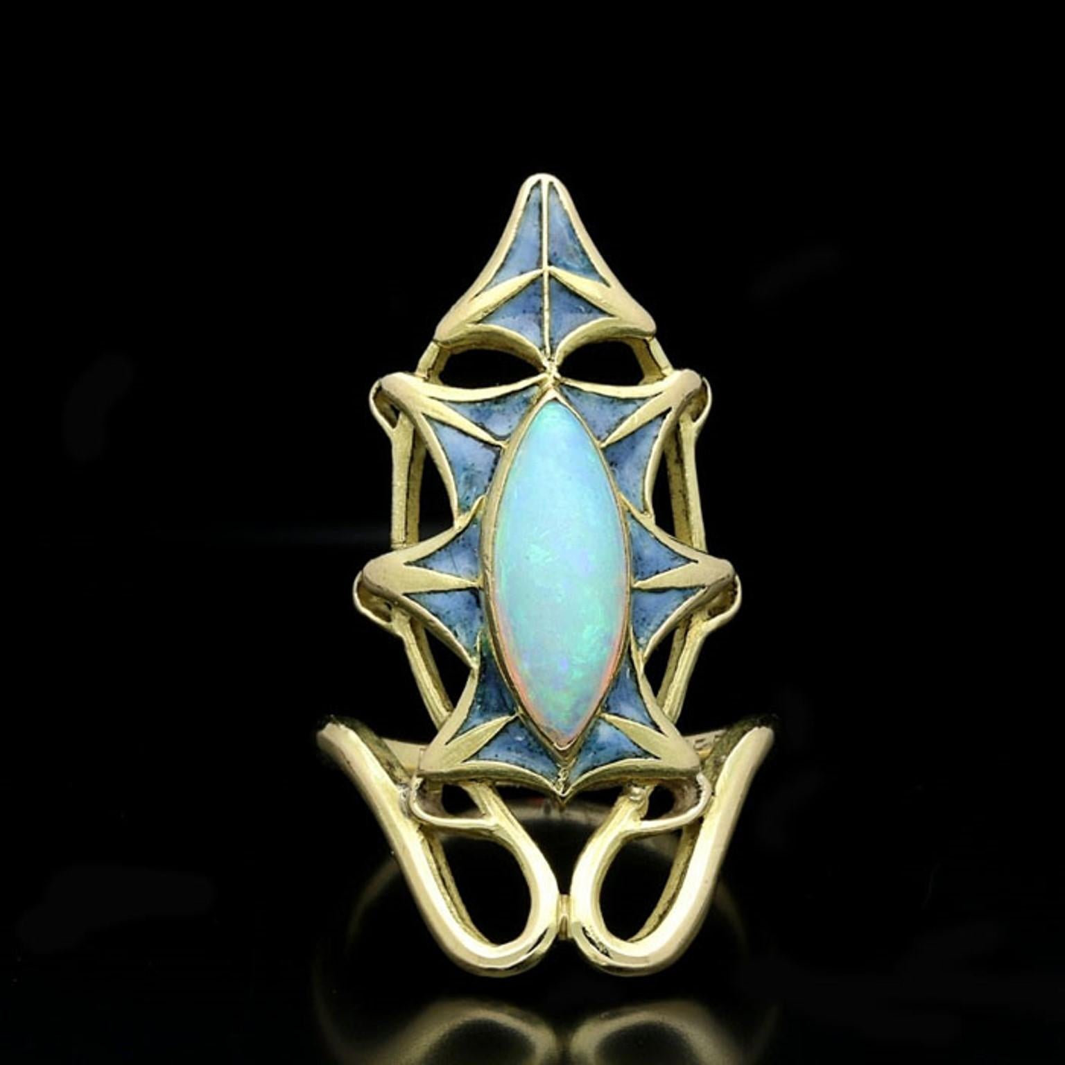 A marquise shaped opal estimated to weigh approximately 0.6cts
18ct yellow gold, signed LALIQUE
Engraved with the name Roger and the date 22 Fevrier 1899
UK finger size G, US 3 3/4
5.3 grams

A rare and attractive ring designed as a sinuous gold