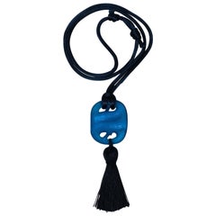 Ciondolo con serpenti in vetro blu di Rene Lalique