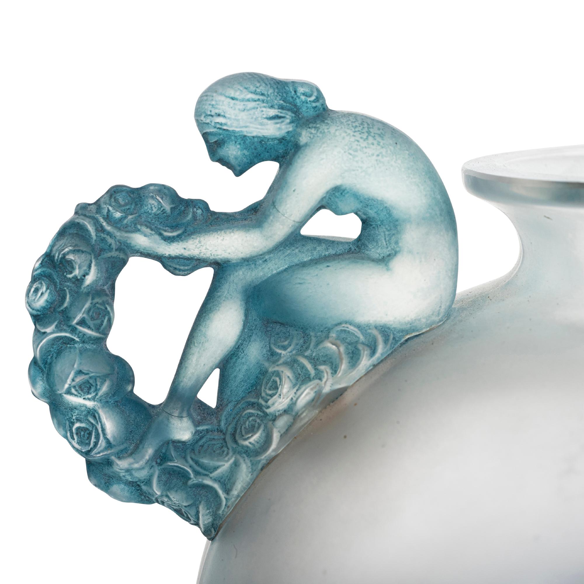 René Lalique, (1860-1945)
'BOUCHARDON'
A clear and frosted glass vase with a bluish green patina,
Model introduced, 1926
Marcilhac 981,
Size: 4 1/4 in. (10.8 cm) high
Script signature R. Lalique.