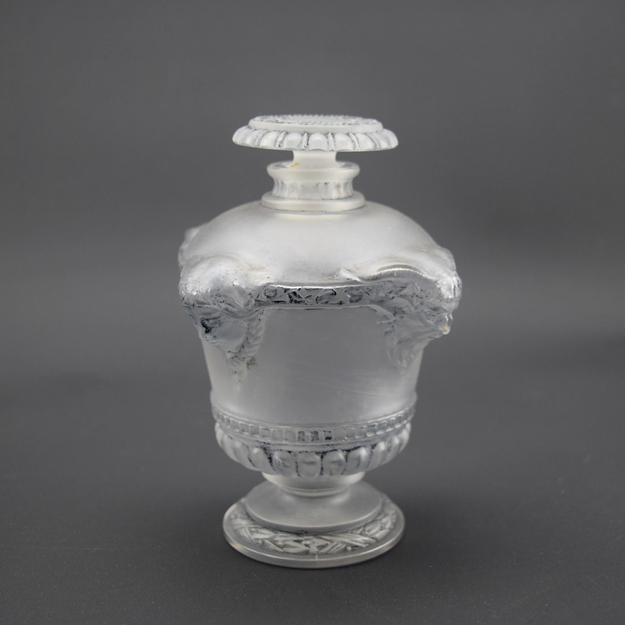 Rene Lalique Bouquet de faunes perfume bottle
Highlighted with grey patina.

Moulded to the side of the bottle Guerlain Paris
The condition is very good with no damage or faults

Marcilhac page ref 940
Model - Guerlain -1 
C1925

The condition is