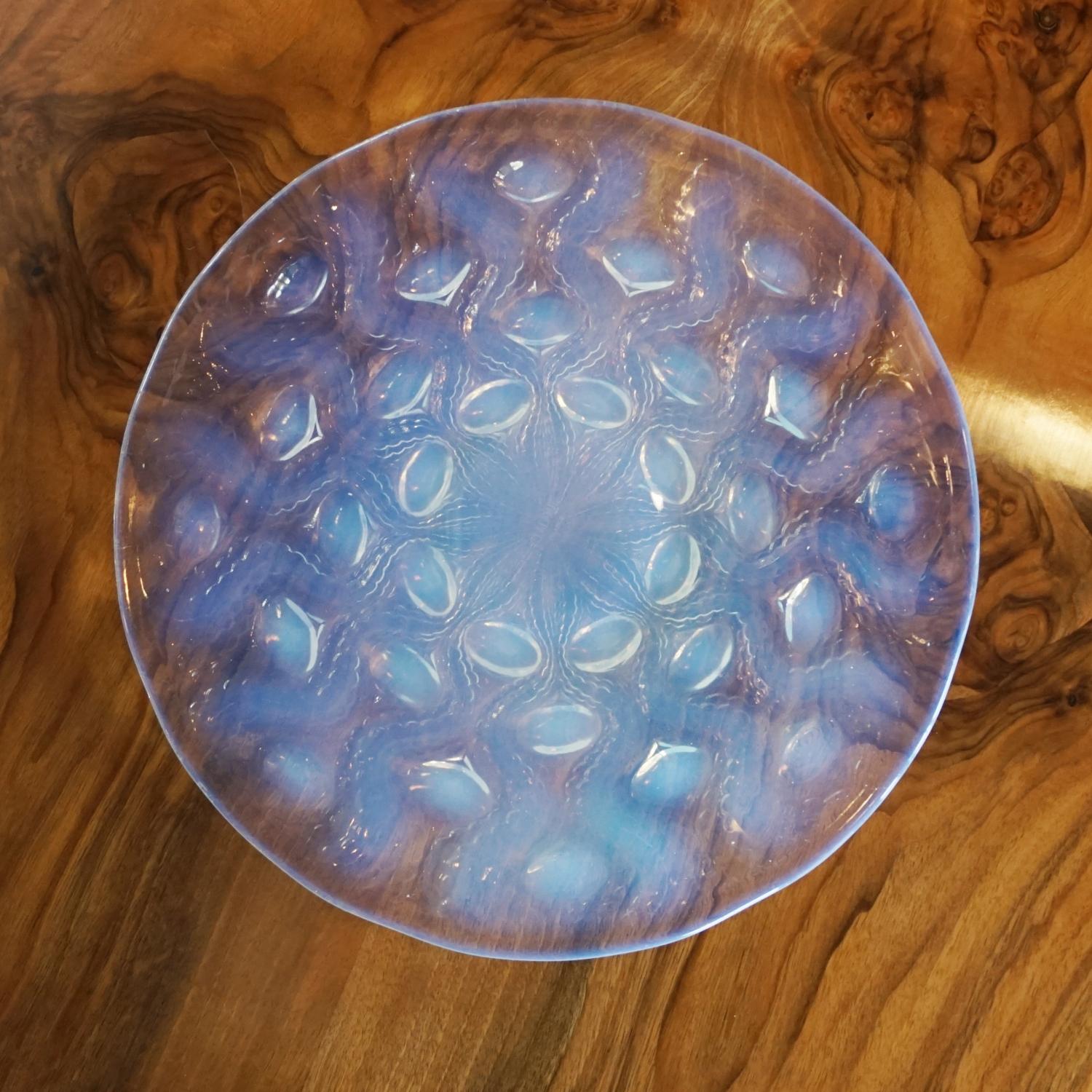 Bulbes, an Art Deco opalescent and frosted glass plate by René Lalique with bubble details. Cloudy blue opalescence. 

Photographed on contrasting backgrounds to accurately represent intricate opalescence. 

Literature: Marcilhac, R Lalique