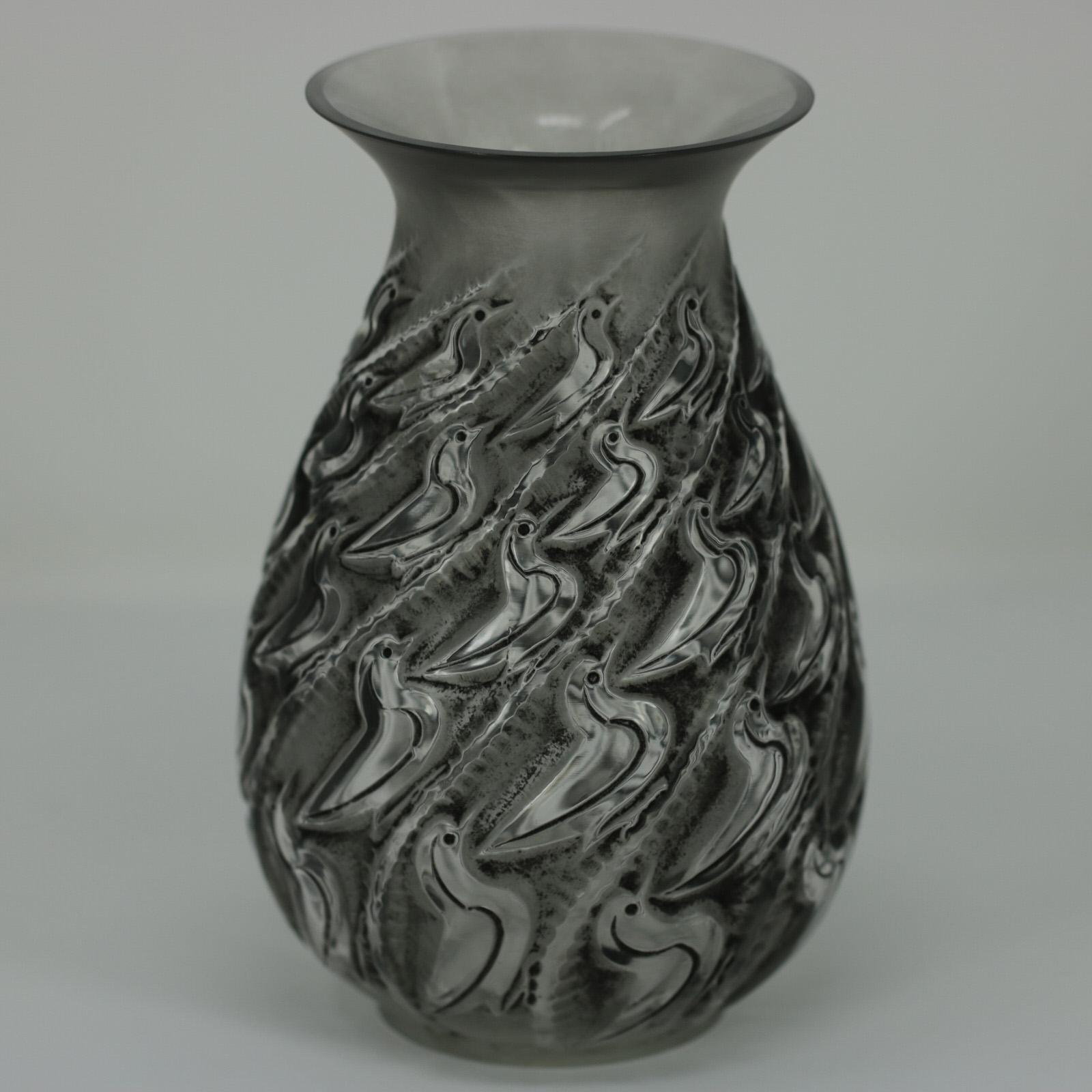 René Lalique clear and frosted glass 'Canards' vase. Grey and black patina applied to the details. This pattern features ducks, sprialling up the sides. The design was created from an initial drawing by Suzanne Lalique (daughter of Rene). Stencilled