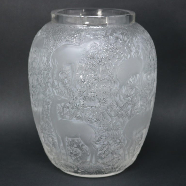 Rene Lalique clear & frosted glass 'Biches' vase. This pattern features hinds (female deer) grazing amongst foliage. Stencilled makers mark, 'R. LALIQUE FRANCE' to the underside. Book reference: Marcilhac 1082.