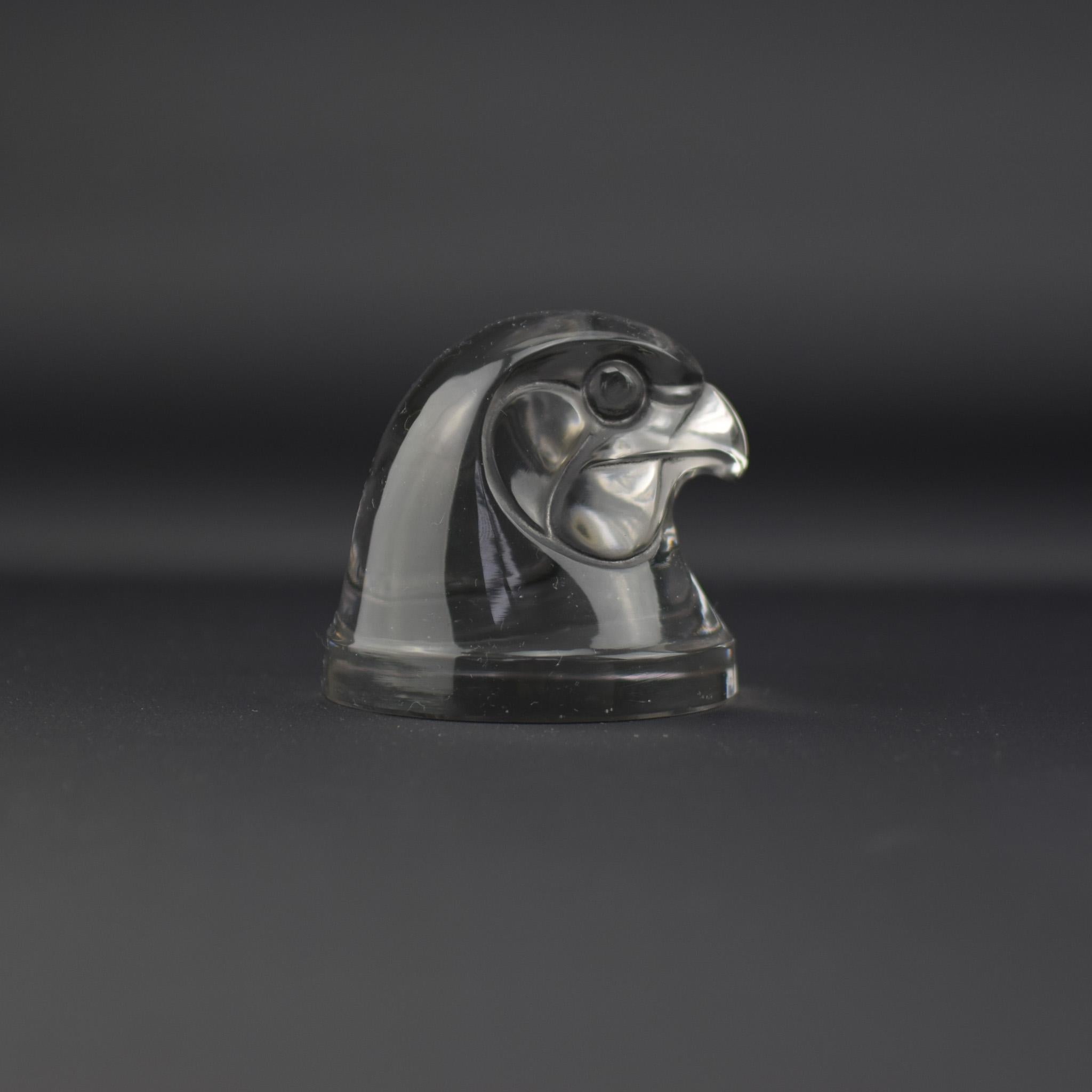 Rene Lalique Clear & frosted Tete d'epervier (hawks head) highlighted with grey staining
Moulded mark to the back of the head Lalique France
The condition is very good with no damage or faults

Marcilhac page ref 499
Model 1139
Introduced in 1928