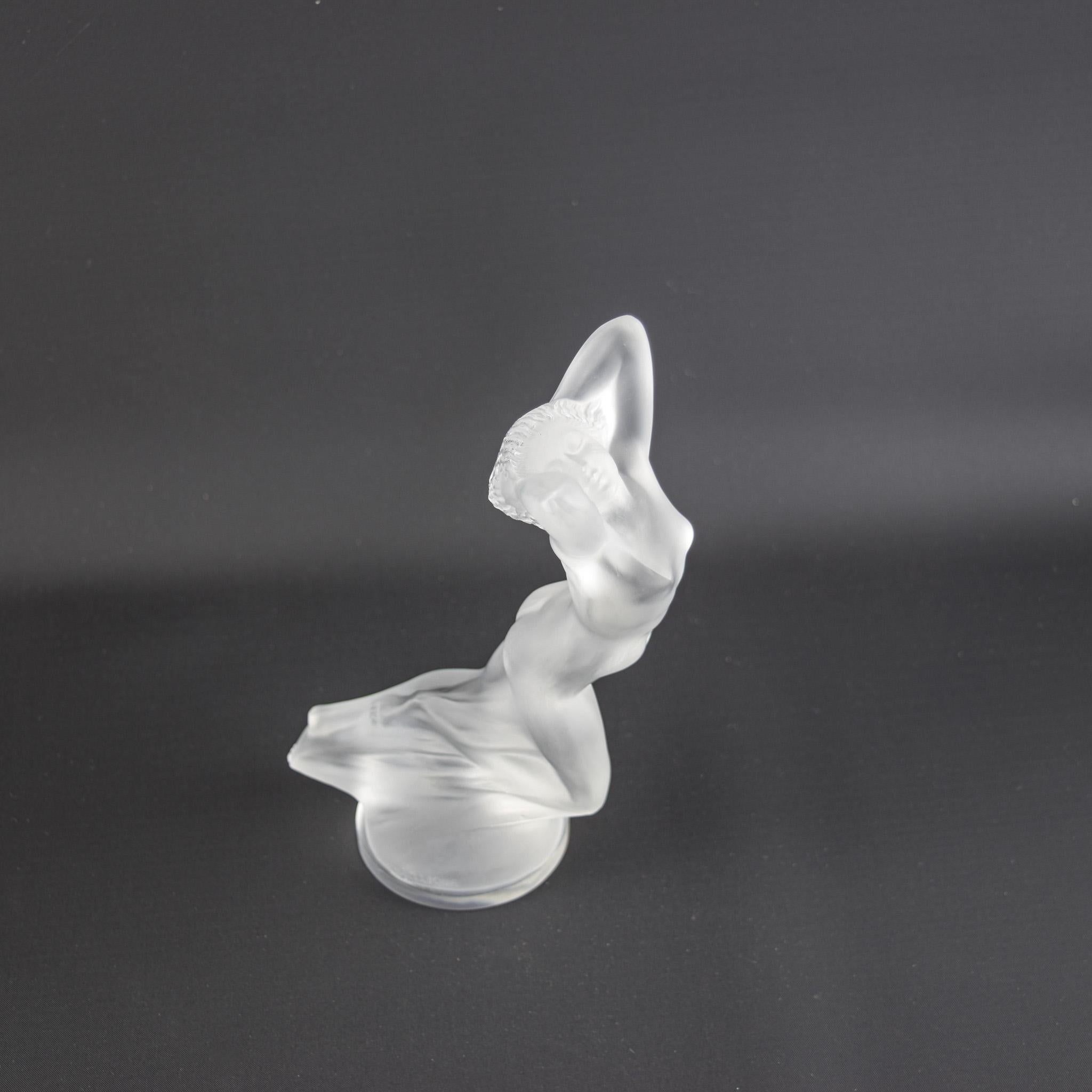 Iconic Rene Lalique clear & frosted Vitesse car mascot modelled as a windswept nude 

Moulded marks R Lalique and France

Marcilhac Page 503
Introduced in 1929
Model Number 1160

The condition is excellent with no damage. There are some wear