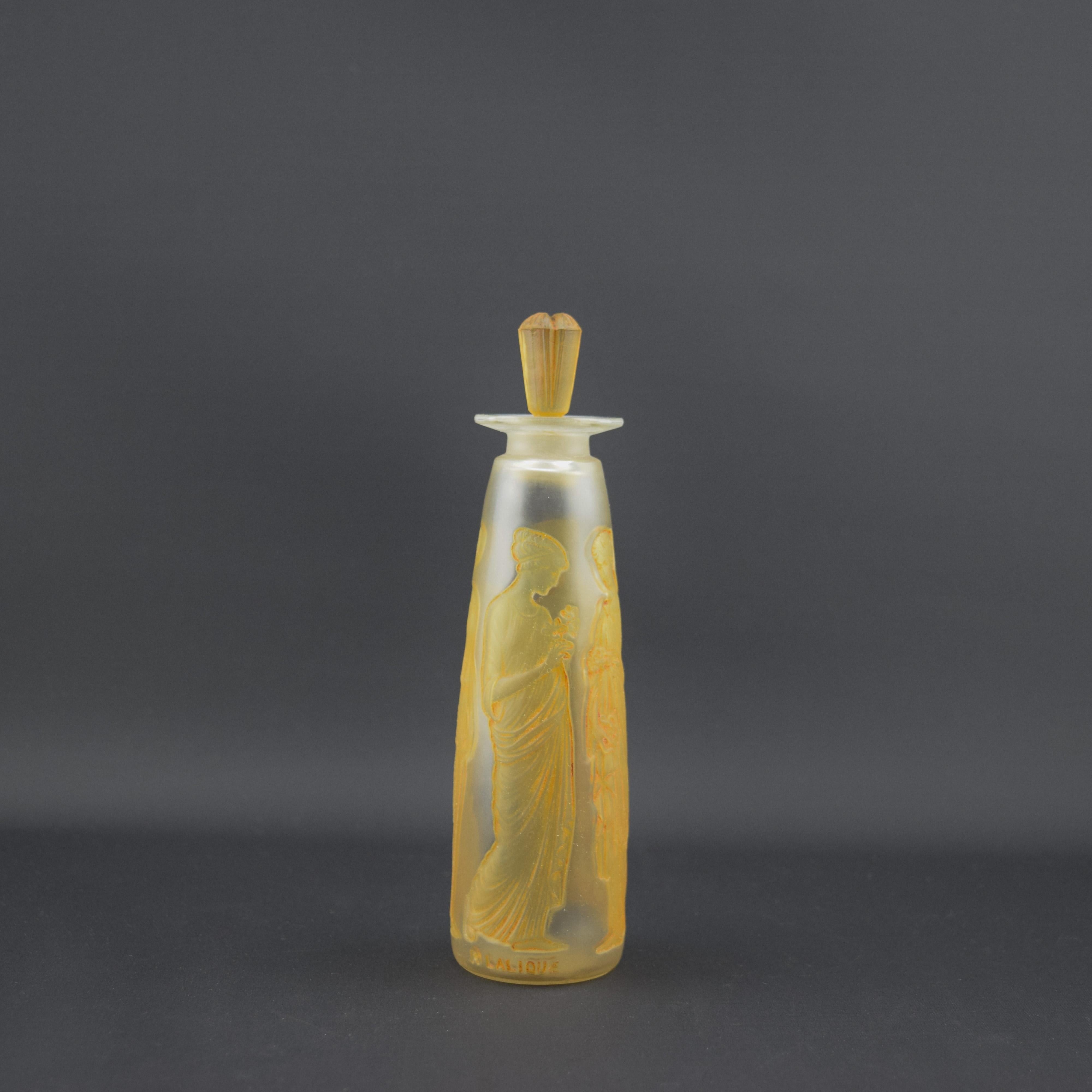 Flacone di profumo Rene Lalique Coty Amber Antique
Classico flacone Coty modellato con la classica fanciulla macchiata di seppia che mette in risalto il dettaglio

Introdotto nel 1910
Marcilhac pagina: 927

Marchio calcografico R Lalique

Le