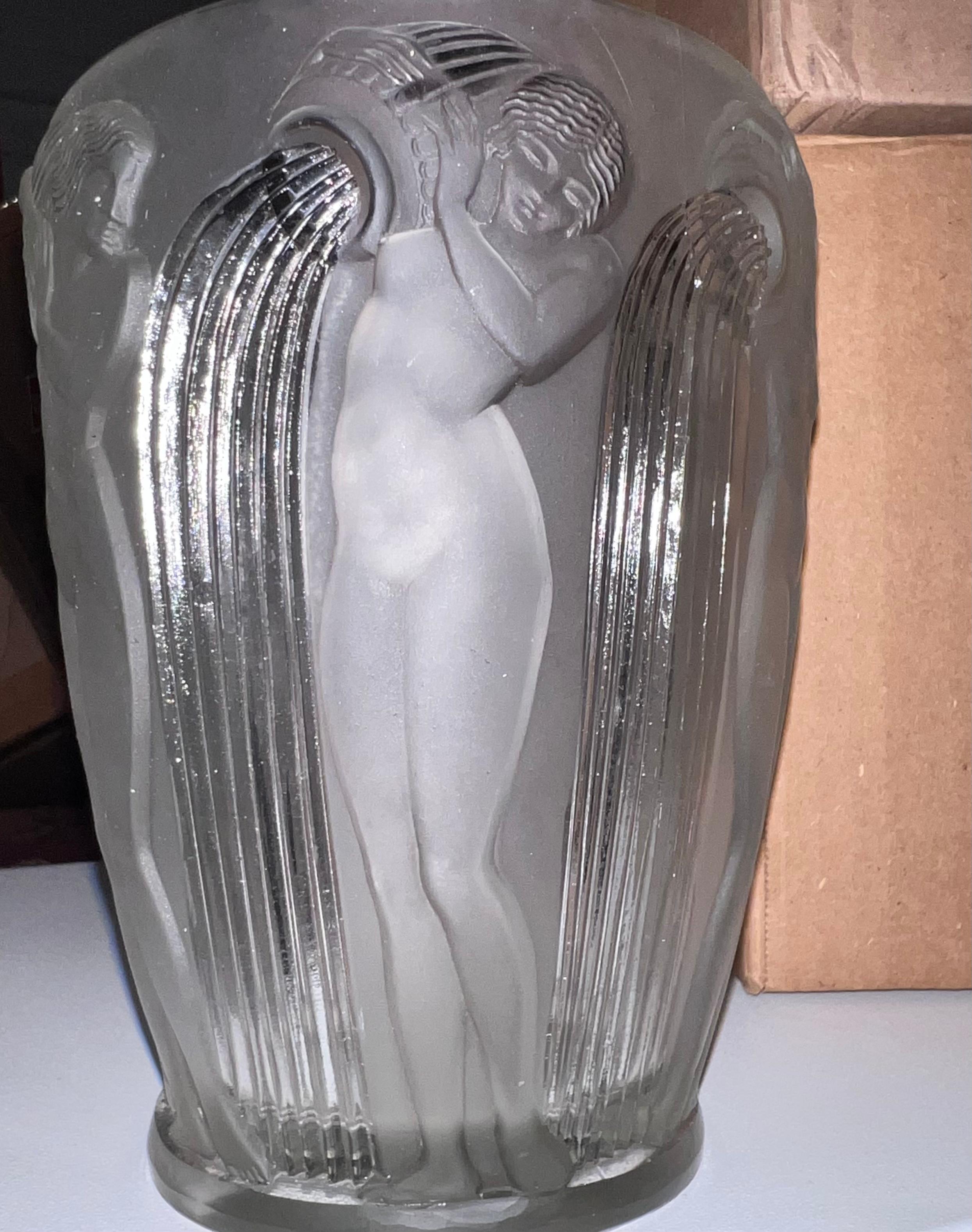 Rene Lalique clear and frosted glass 'Danaides' vase. This pattern features the Daughters of Danaus stood pouring water from a vessel. Molded makers mark, 'R. LALIQUE', to the underside. Book reference: 'R. LALIQUE Catalogue Raisonné De L'Oeuvre De