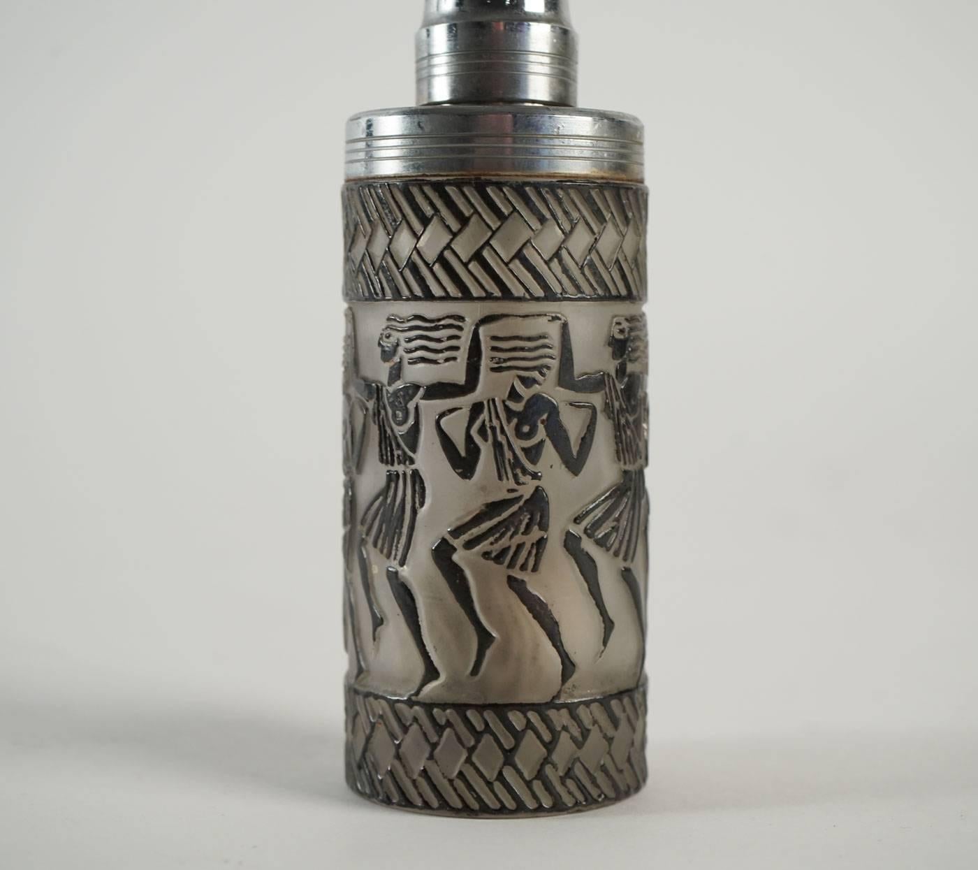 Danseuses Egyptiennes perfume burner: frosted and enameled Egyptian dancers theme glass under a metal top and cap model: Marcas-Et-Bardel-Perfume-Burner-1, circa 1926.