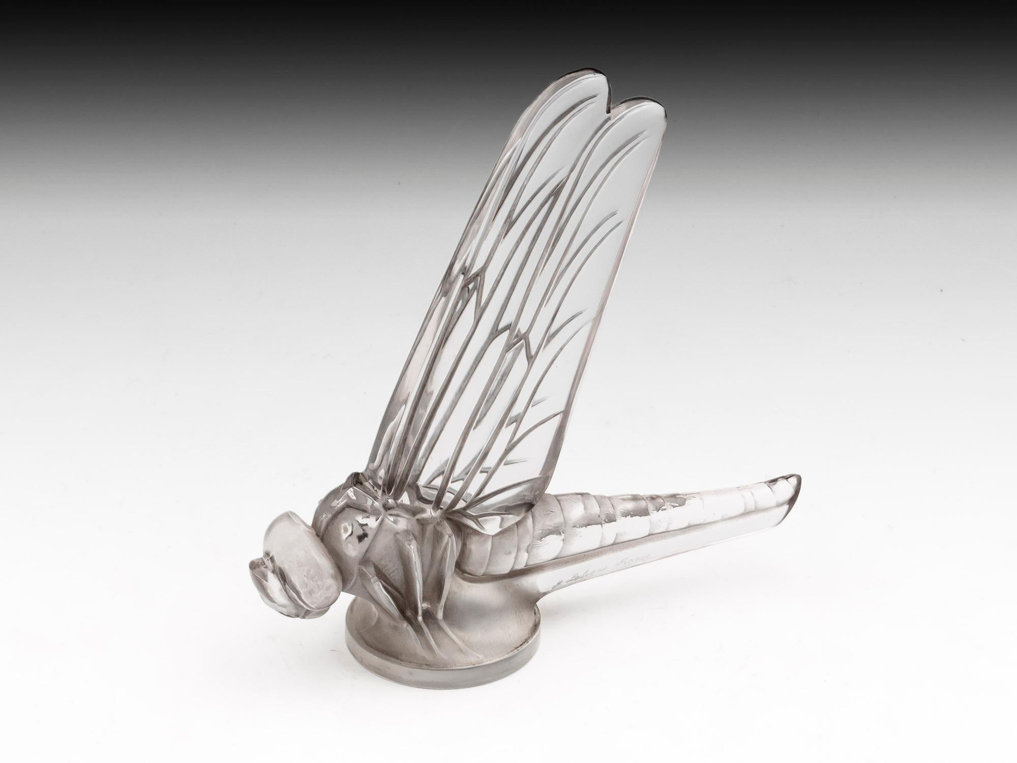 René Lalique car mascot, Grande Libellule / Large Dragonfly, great color and patination. Model number: #1144. Faint molded mark under body and etched on tail. 

This fabulous Dragonfly Carmascot by René Lalique is being offered for sale in A1