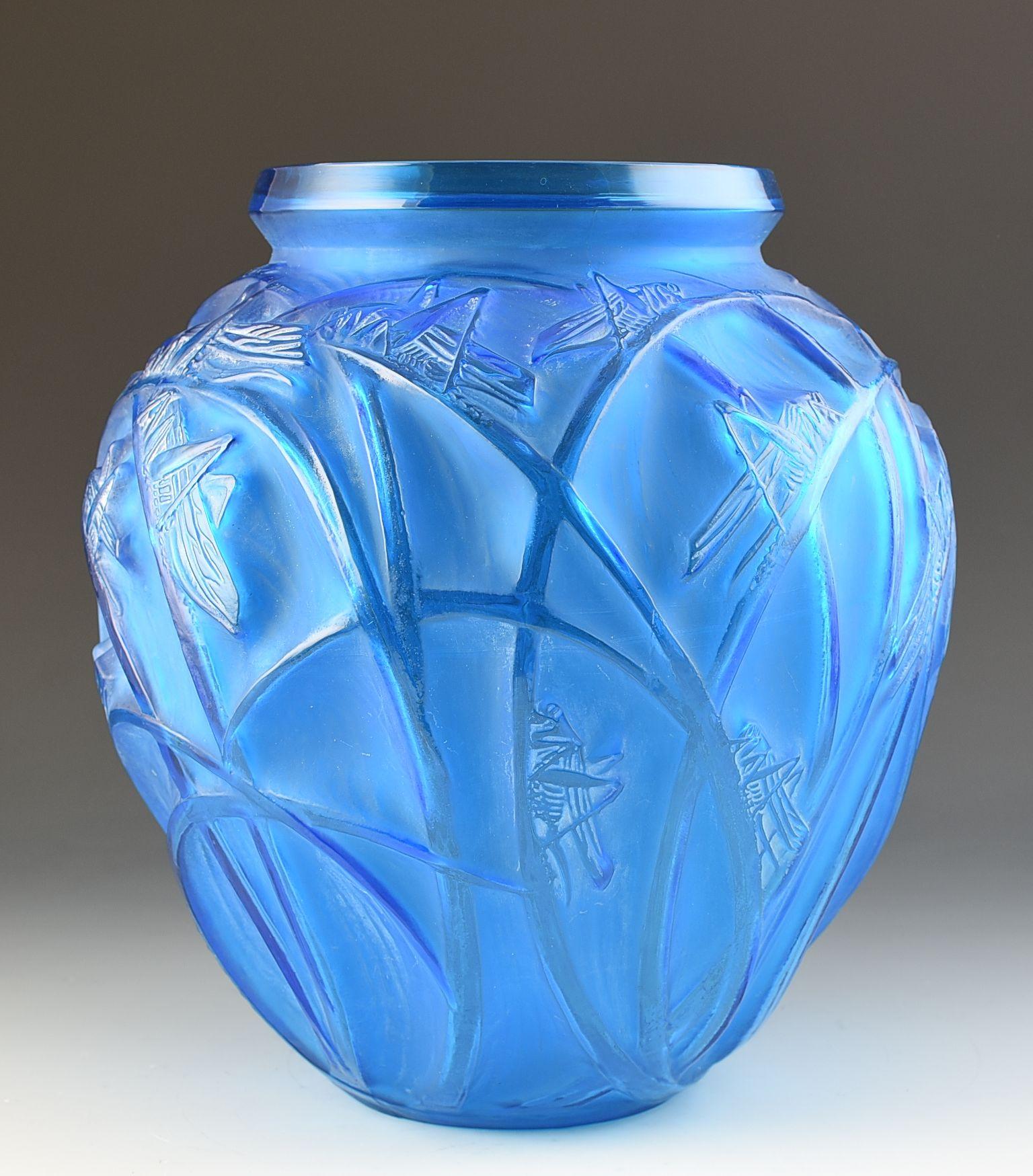 Rene Lalique Electric blue Sauterelles vase introduced c.1912 model #888. An exceptional example in perfect original condition that i can GUARANTEE to be free from restoration or later polishing. Overall height is 27.5cm and is signed to the base.