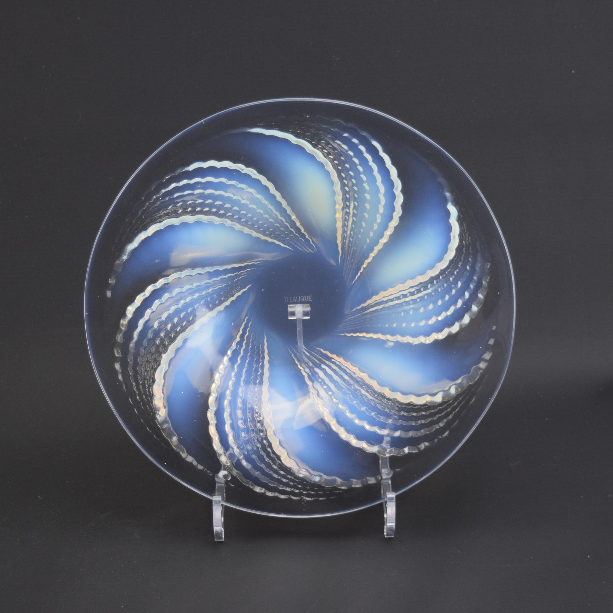 Rene Lalique Fleurons coupe plate ( shallow bowl) No2

Introduced in 1935
Marcilhac page reference 722

Stenciled mark R Lalique France

The condition is excellent with no damage or surface scratches.