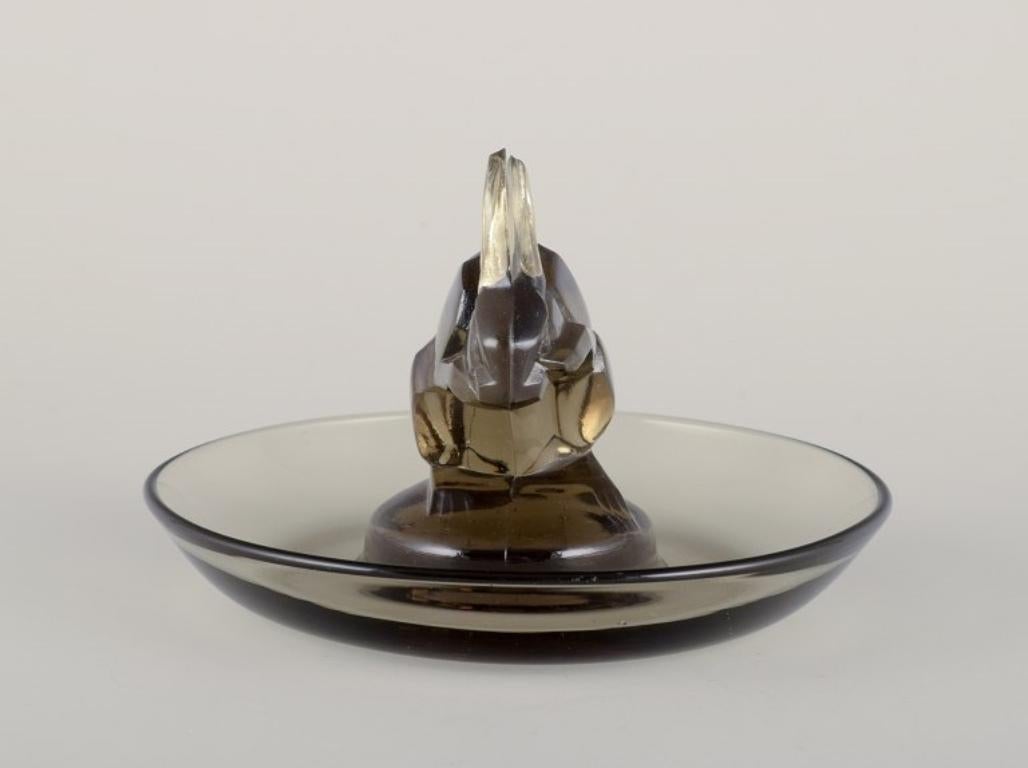 French René Lalique, France. Early Art Deco pin dish with a rabbit in smoked art glass.