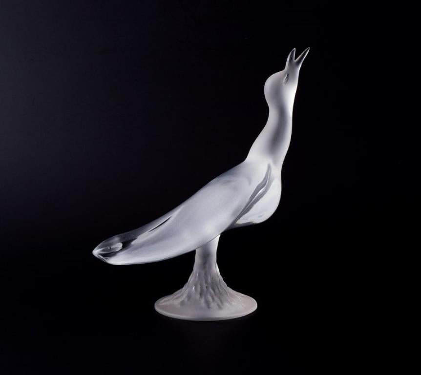 René Lalique (1860-1945), France.
Large art glass sculpture of a bird in clear glass.
Handmade.
1970s/80s.
Marked.
Perfect condition.
Dimensions: B 19.0 cm x H 22.7 cm.