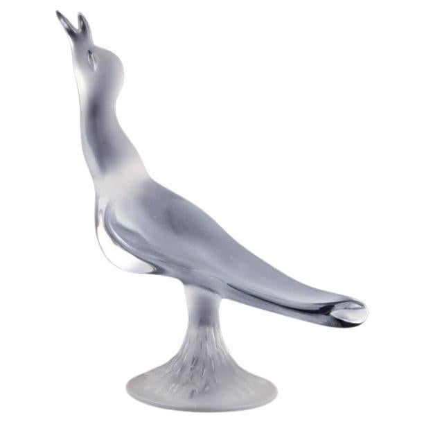 René Lalique, France. Large art glass sculpture of a bird in clear glass.