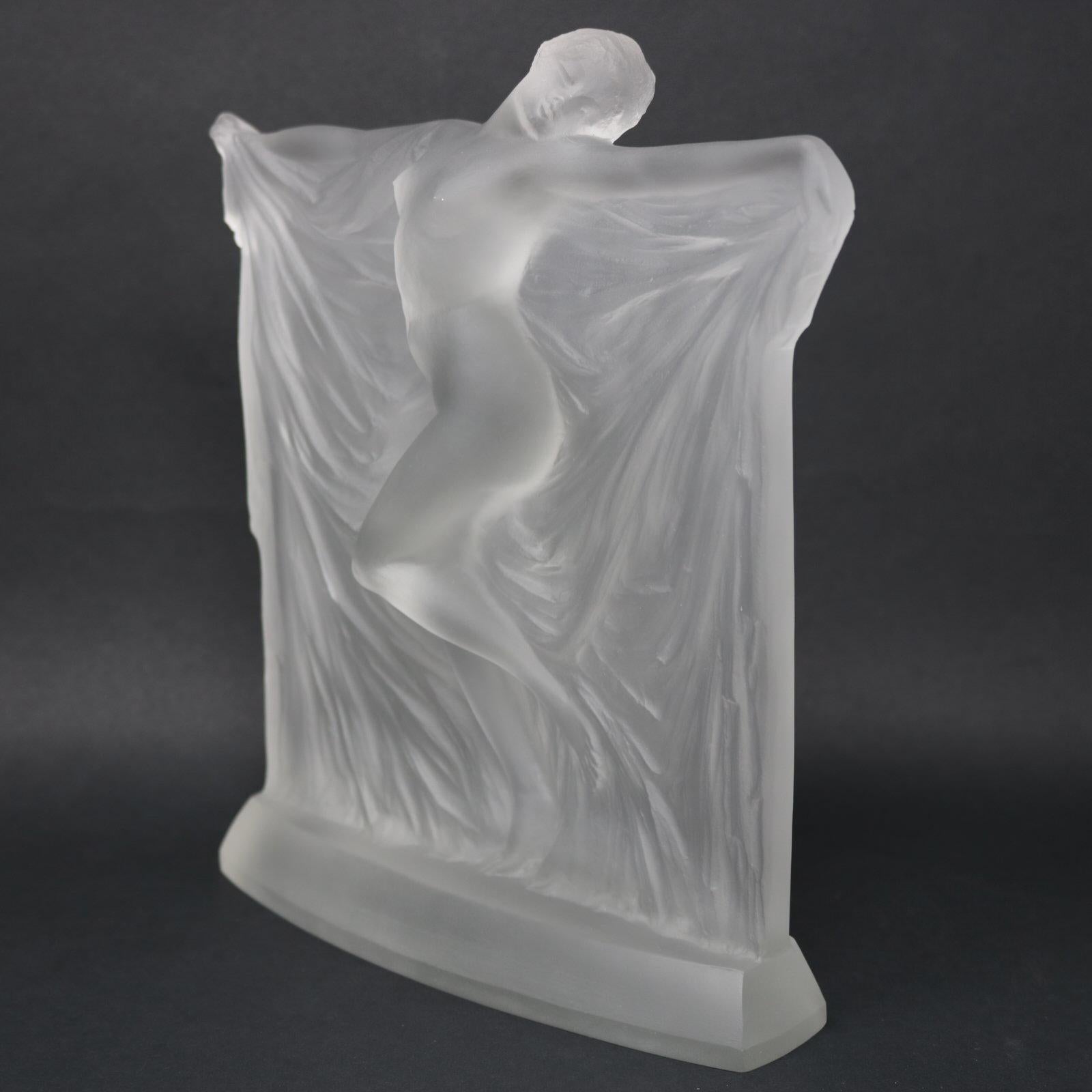 Lalique Frosted glass 'Thais' Statuette. This figure features an elegant dancing nude, head tilted, her arms held out to her sides, holding a drape. Wheel cut makers mark, 'R LALIQUE' to the reverse. Book reference: Marcilhac 834.