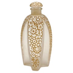 René Lalique glass art deco perfume bottle "Toutes les fleurs"