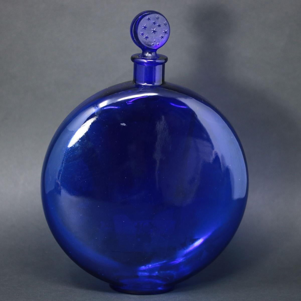 blue glass perfume bottle