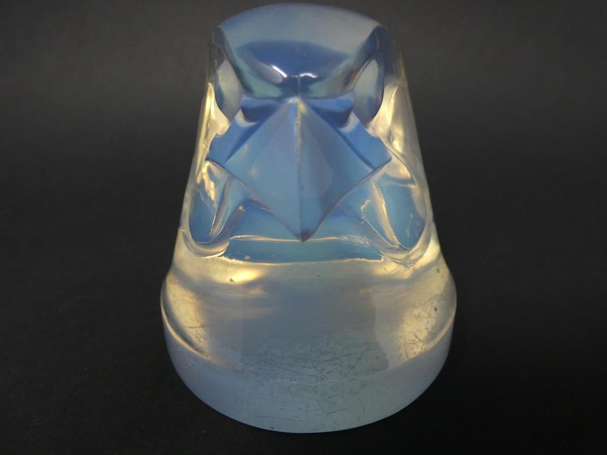 Rene Lalique Opalescent glass 'Tete d'epervier' Mascot. Featuring a falcons head. Moulded makers mark, 'LALIQUE FRANCE'. Book reference: Marcilhac 1139.