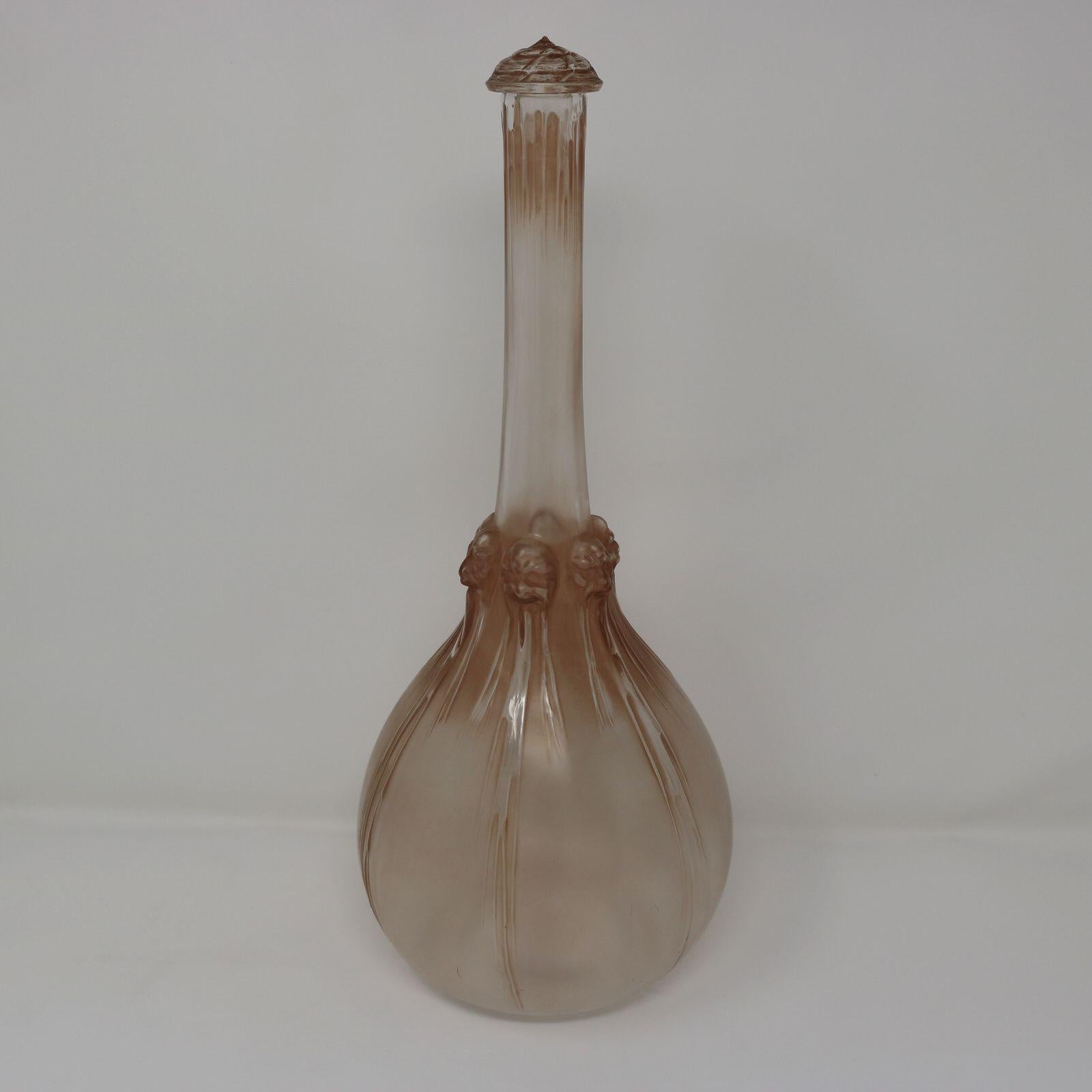 Dekanter „Six Tetes“ aus Glas von Rene Lalique „Six Tetes“ (Frühes 20. Jahrhundert) im Angebot