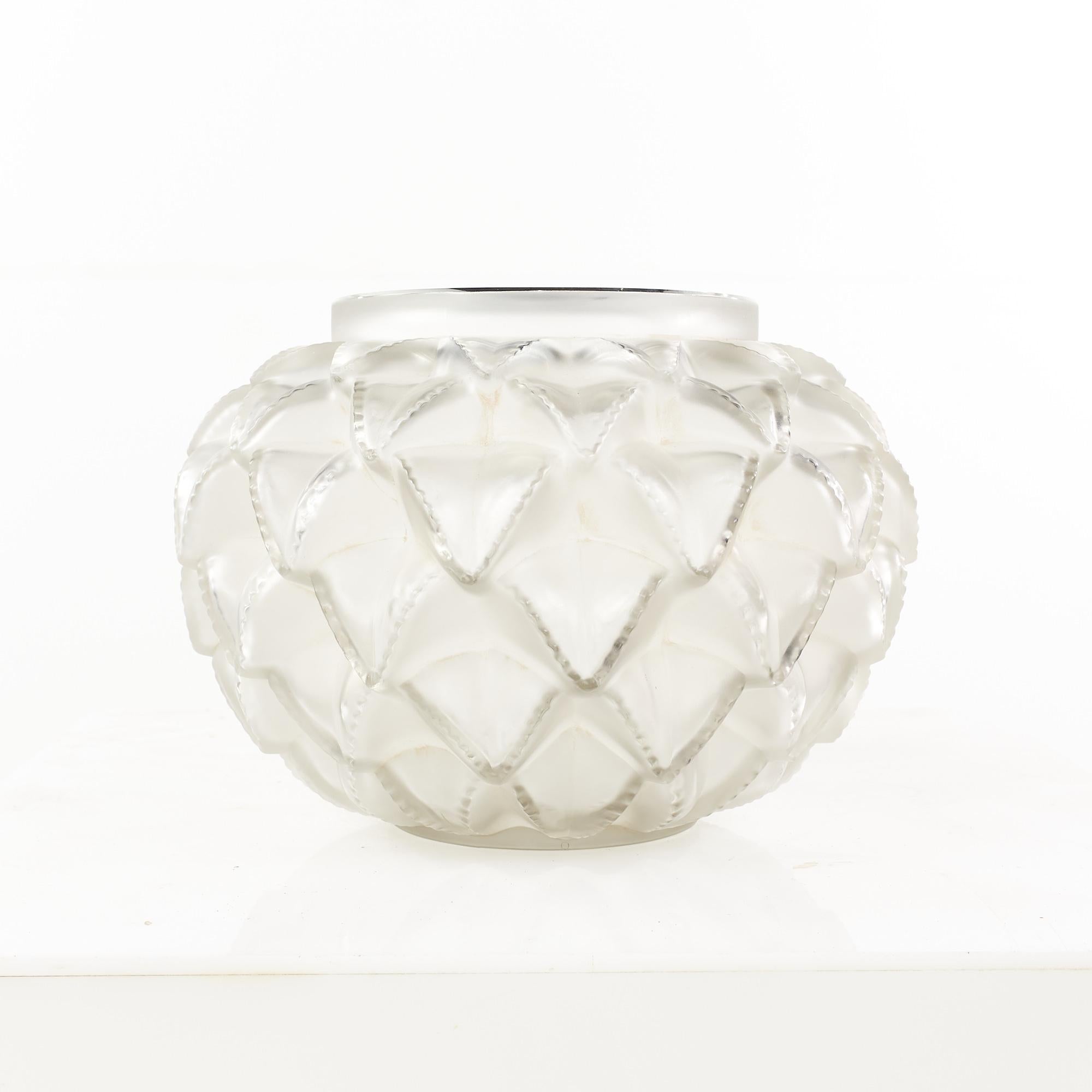 Rene Lalique Languedoc Vase

This vase measures: 12 wide x 12 deep x 8.5 inches high 

This vase is in Excellent Vintage Condition with some general wear from age.

We take our photos in a controlled lighting studio to show as much detail as