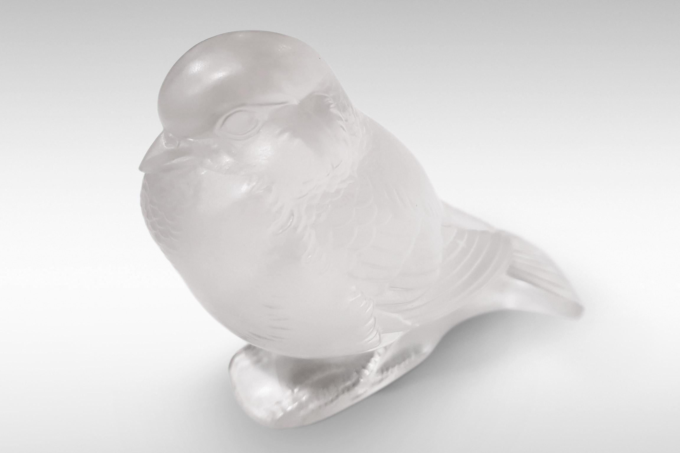 The Art Deco 'Moineau au Fier' (Crouching Sparrow) by Rene Lalique in opalescent glass, circa 1930s.