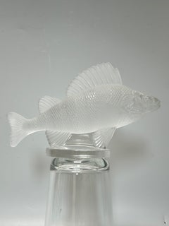 René Lalique Molded glass radiator cap/paperweight.