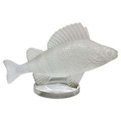 René Lalique Molded glass radiator cap/paperweight.