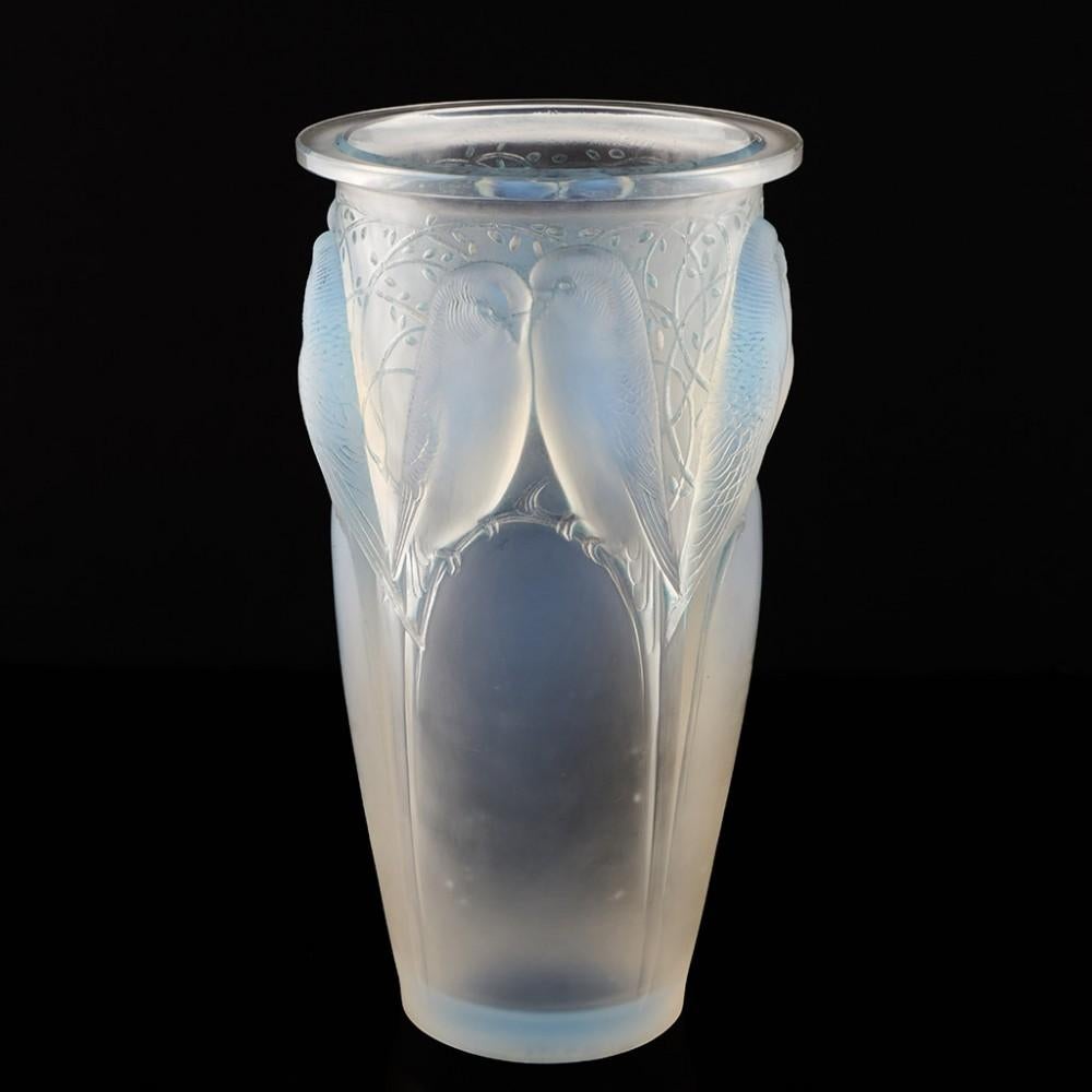 Heading : A signed Rene Lalique Ceylan vase
Date : Designed 1924, Marcilhac 905 , not made after 1947
Origin : Wingen-sur-Moder, France
Marks : Incised on the base R LALIQUE FRANCE
Type : Opalescent demi-crystal
Size : Height 24.2cm
Condition :