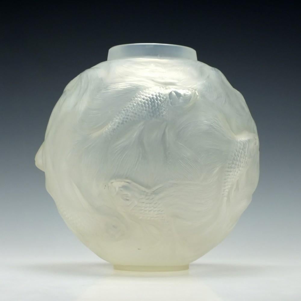 René Lalique opalescent Formose vase Marcilhac 934

Designed 1924

Signed R Lalique France on the base

One of the most highly regarded of all Lalique designs.