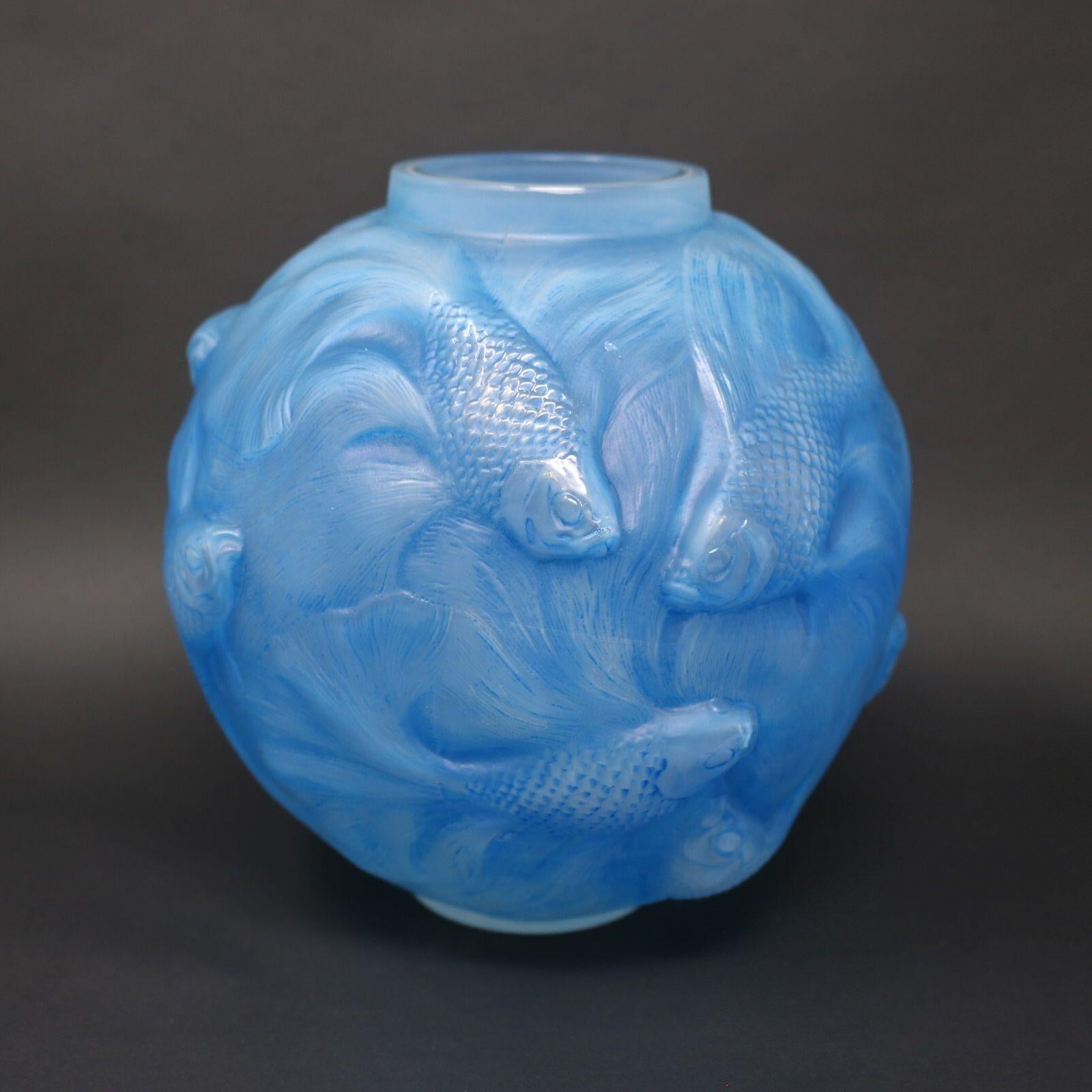 Rene Lalique opalescent glass Formose vase. Blue stained details. This pattern features exotic fish. The name Formose refers to the old European name for Taiwan. Engraved makers mark, 'R. Lalique France'. Book reference: Marcilhac 934.